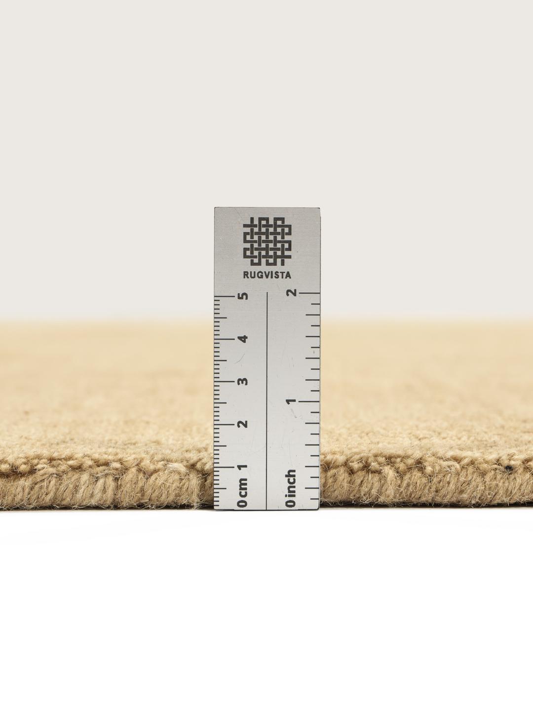 Beige runner rug with short fringes