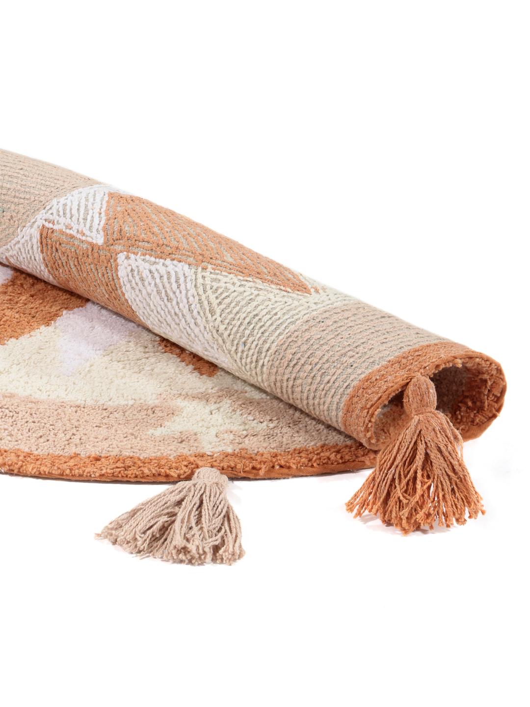 Tapis de bain rond terracotta avec motif étoile et bordure à franges
