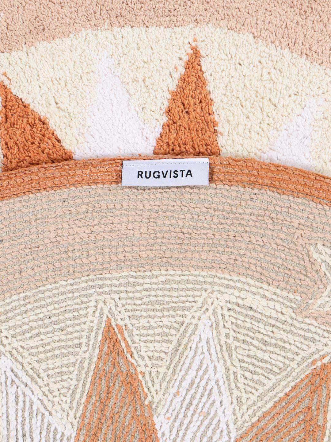 Tapis de bain rond terracotta avec motif étoile et bordure à franges