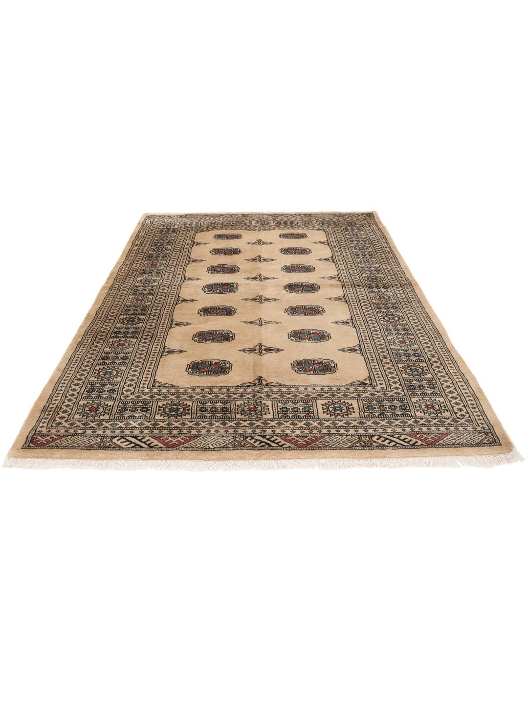 A hand-knotted Pakistan Bokhara rug with a beige field and traditional geometric motifs.