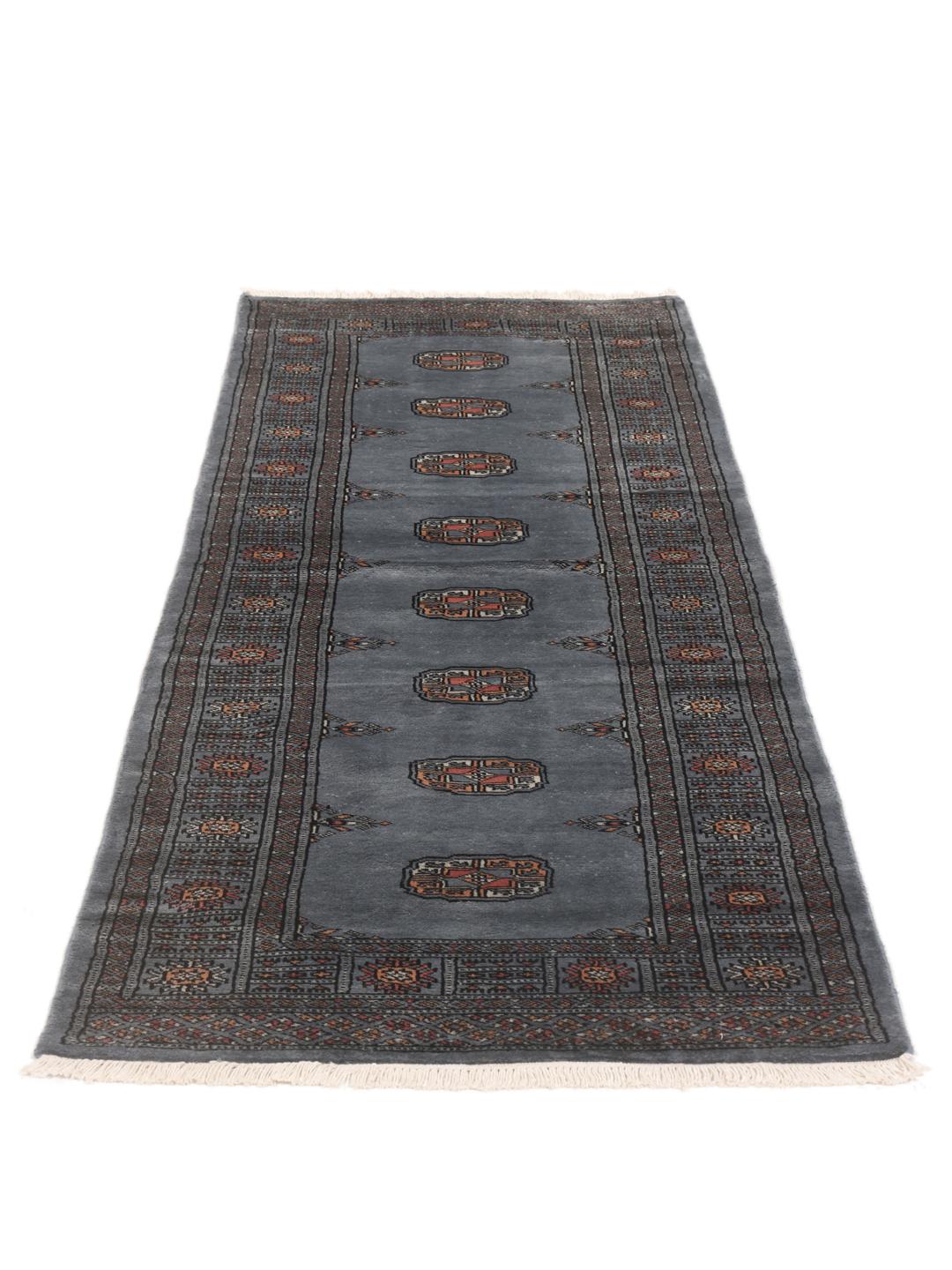 Hand-knotted Pakistan Bokhara runner in blue with traditional motifs