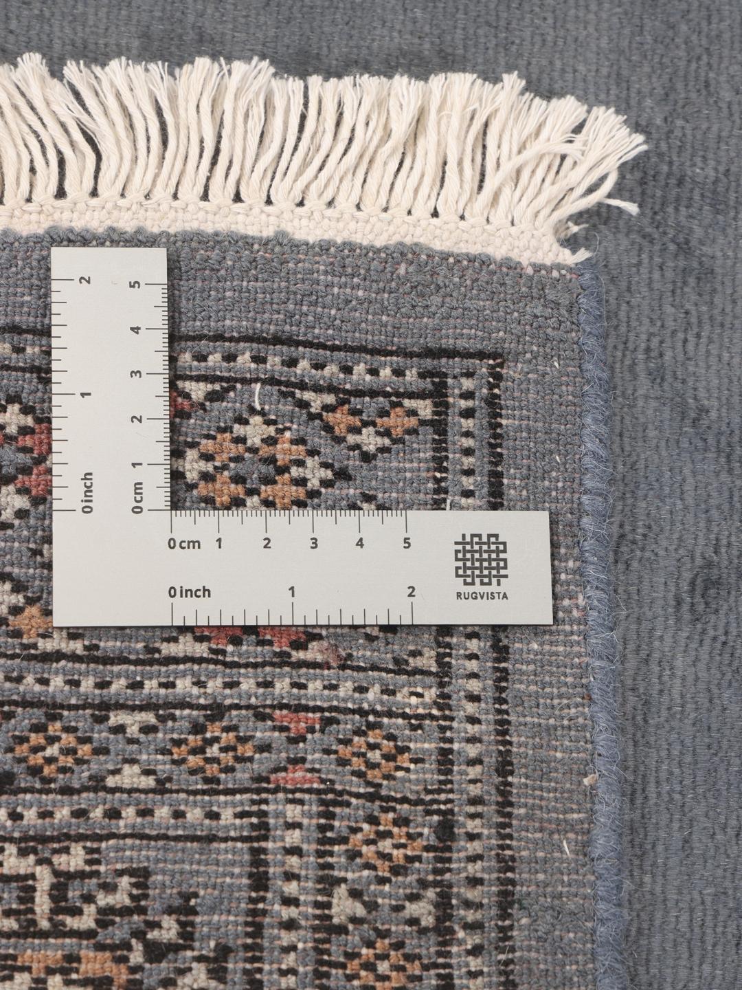 Hand-knotted Pakistan Bokhara runner in blue with traditional motifs