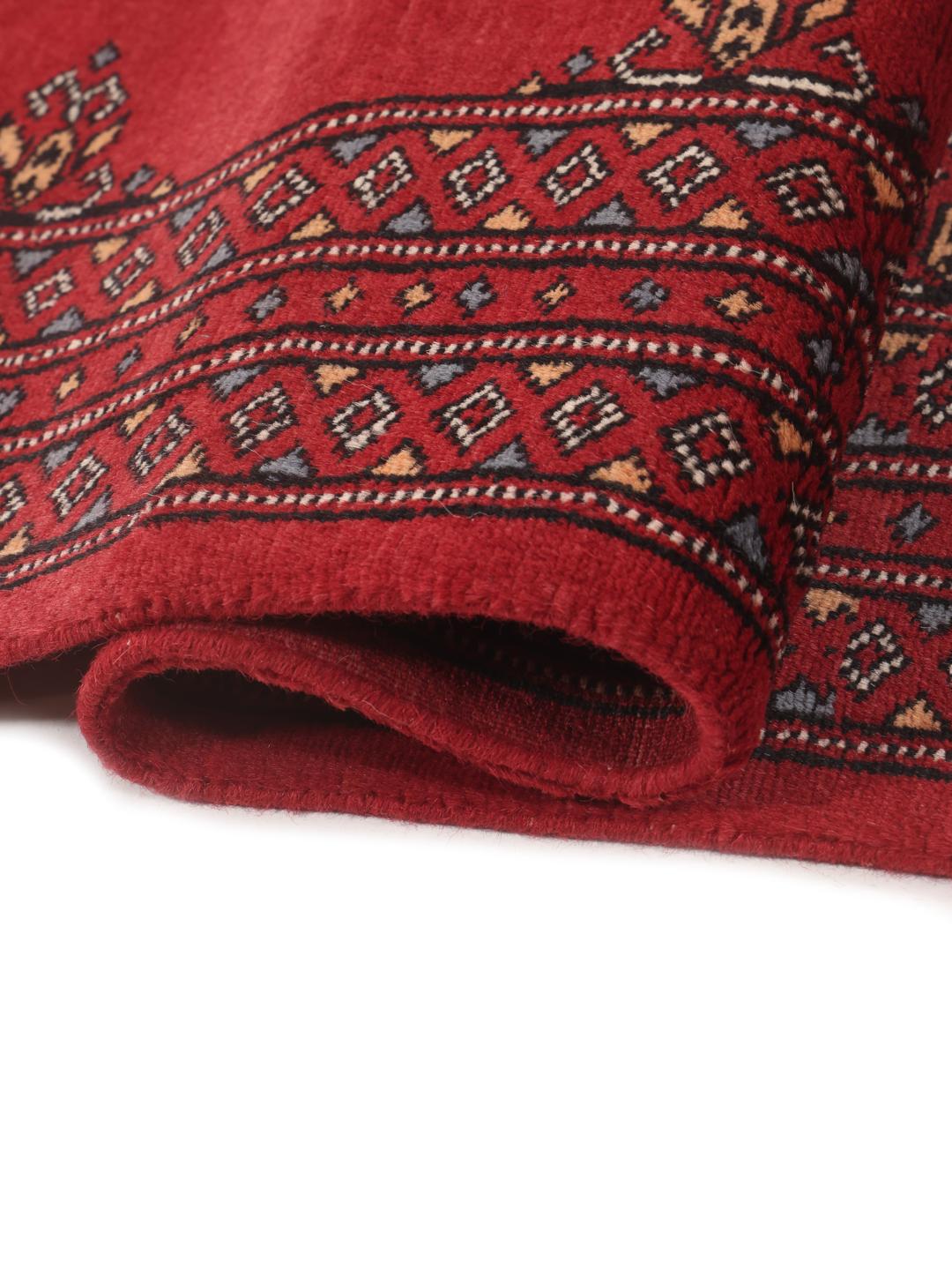 Hand-knotted red Pakistan Bokhara runner rug