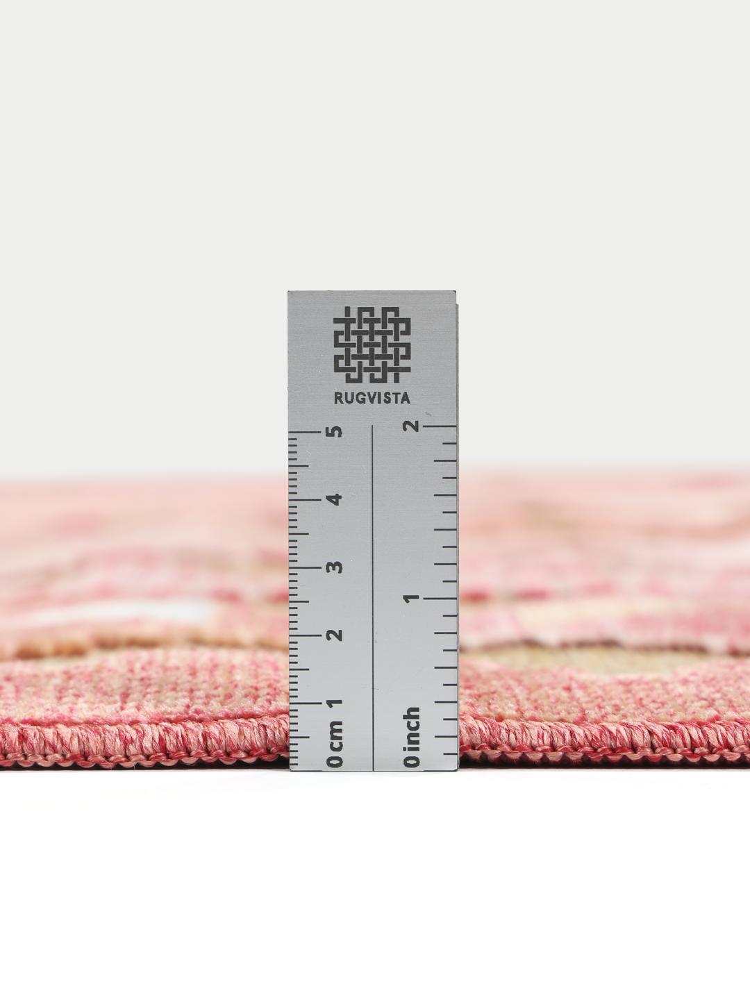 Rond vloerkleed met een beige en meerkleurig patroon geïnspireerd op kilims