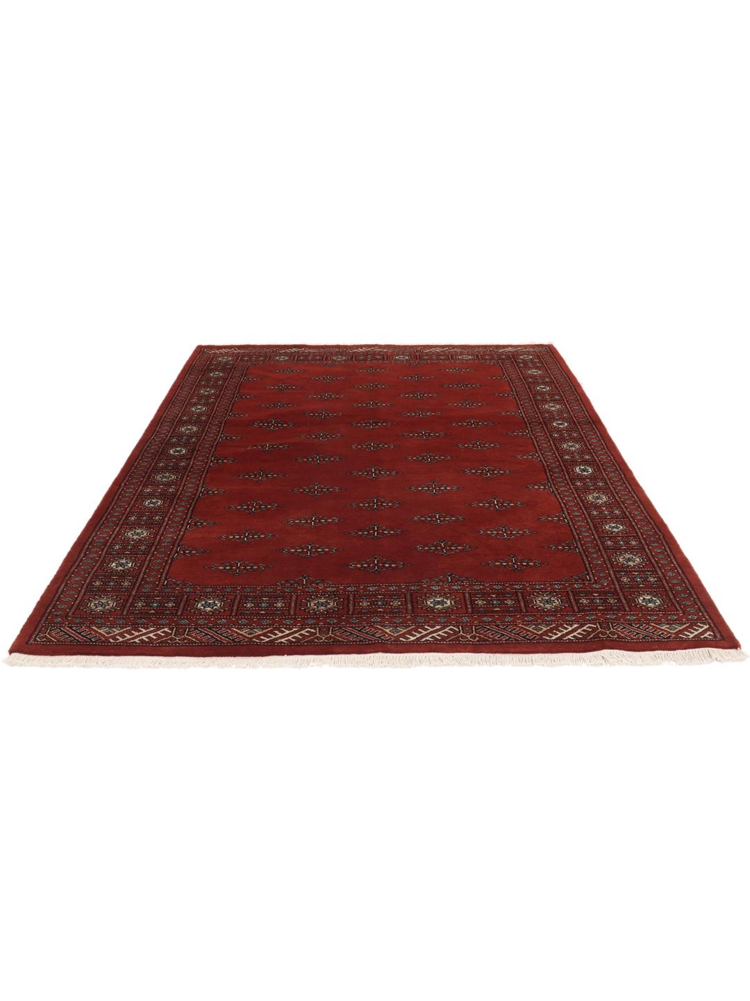 A hand-knotted Pakistan Bokhara rug in deep red with repeating geometric motifs.