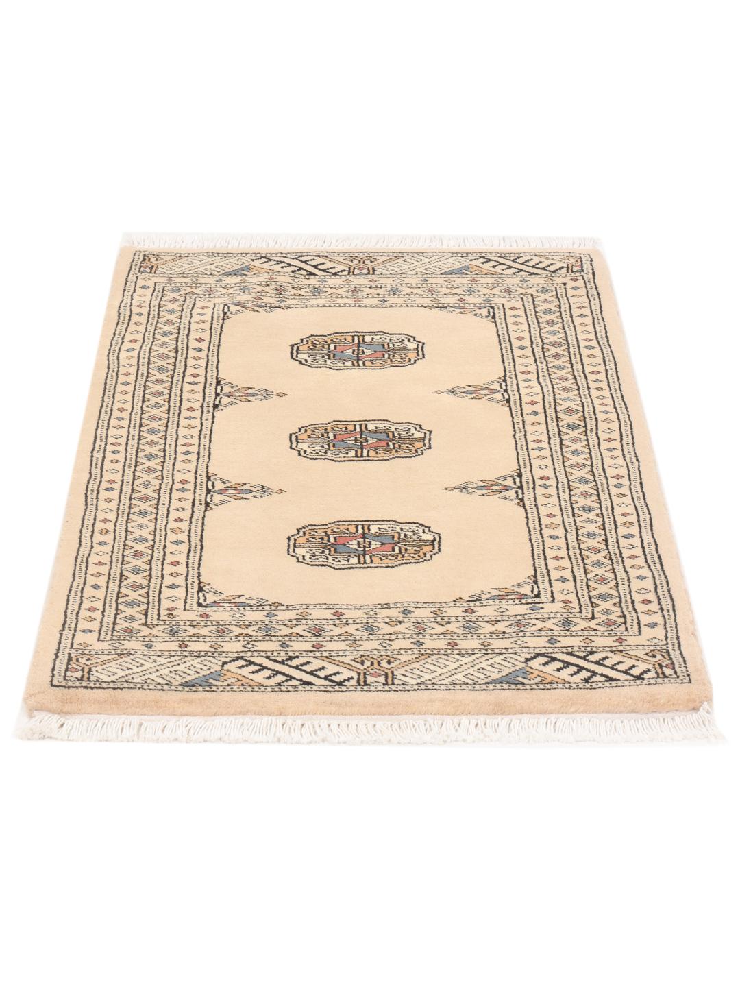 A hand-knotted Pakistani Bokhara rug in beige with traditional medallion motifs.