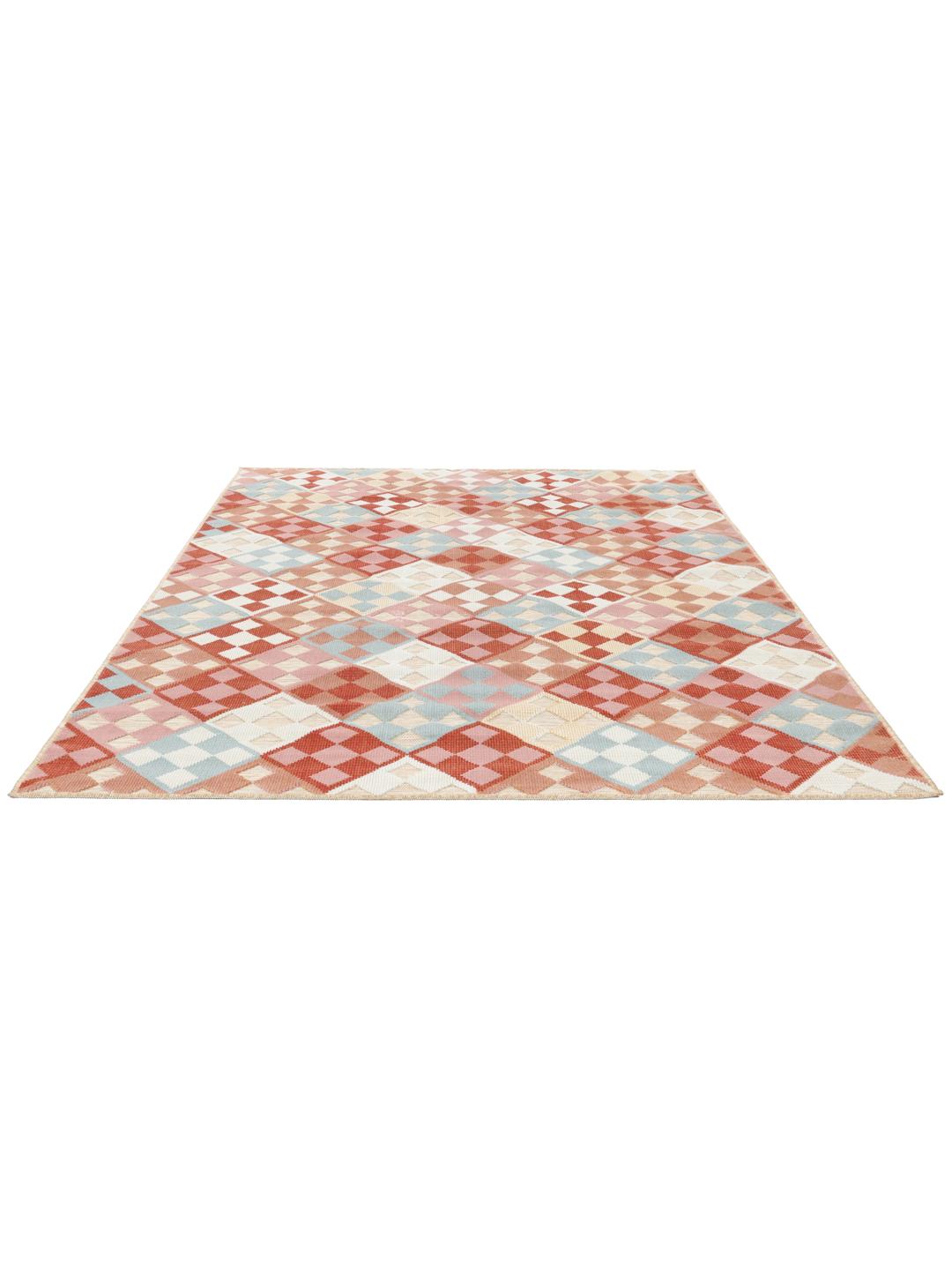 Beige tæppe med et geometrisk mønster