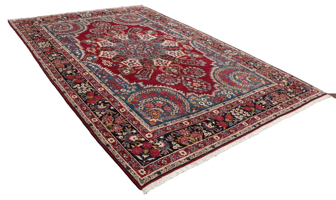 Handgeknoopt Keshan-tapijt met bloemmotieven in donkerrood en blauw