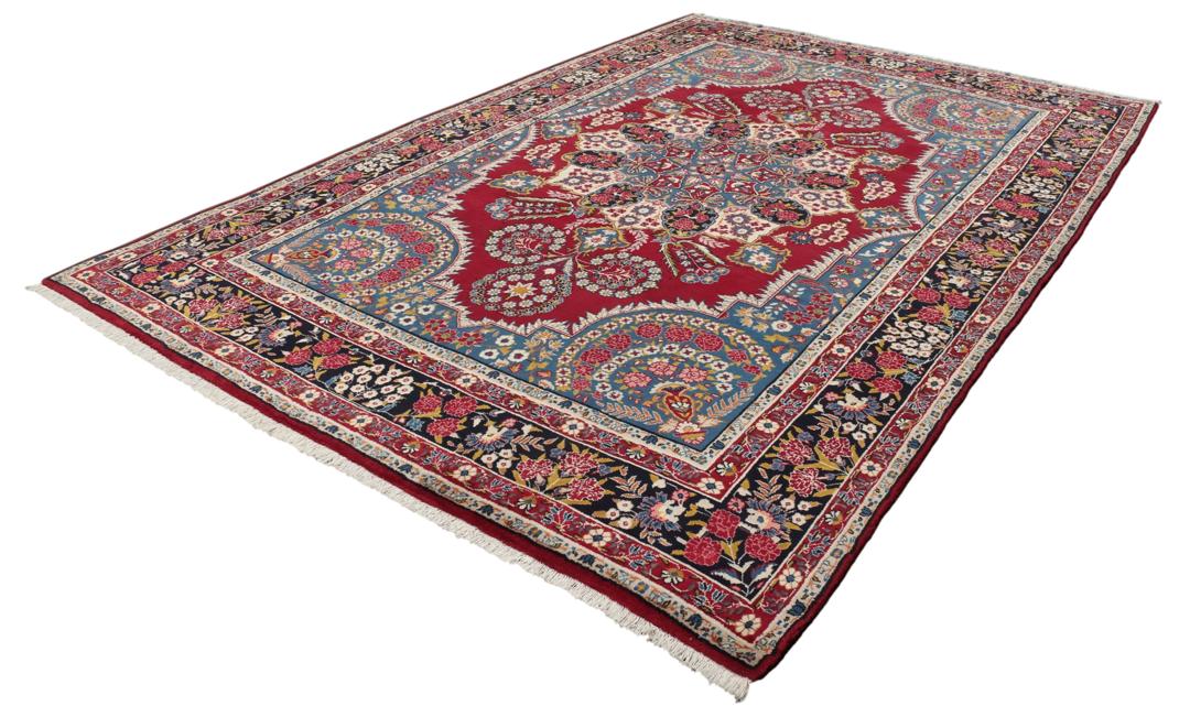 Handgeknoopt Keshan-tapijt met bloemmotieven in donkerrood en blauw