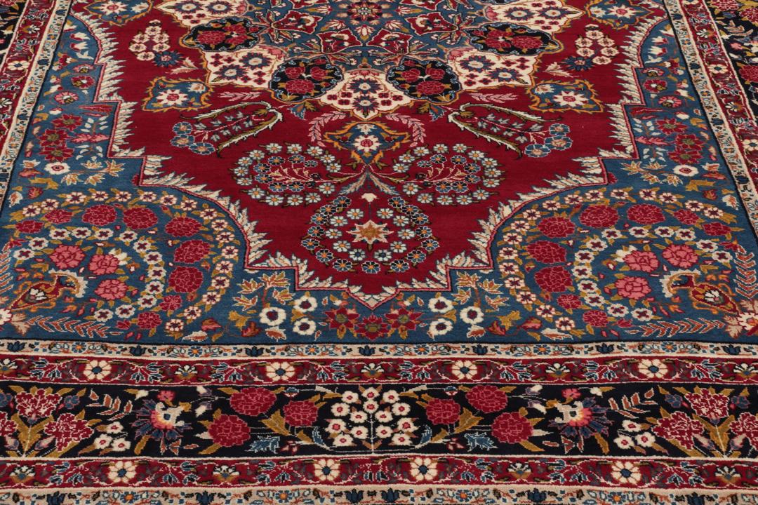 Handgeknoopt Keshan-tapijt met bloemmotieven in donkerrood en blauw
