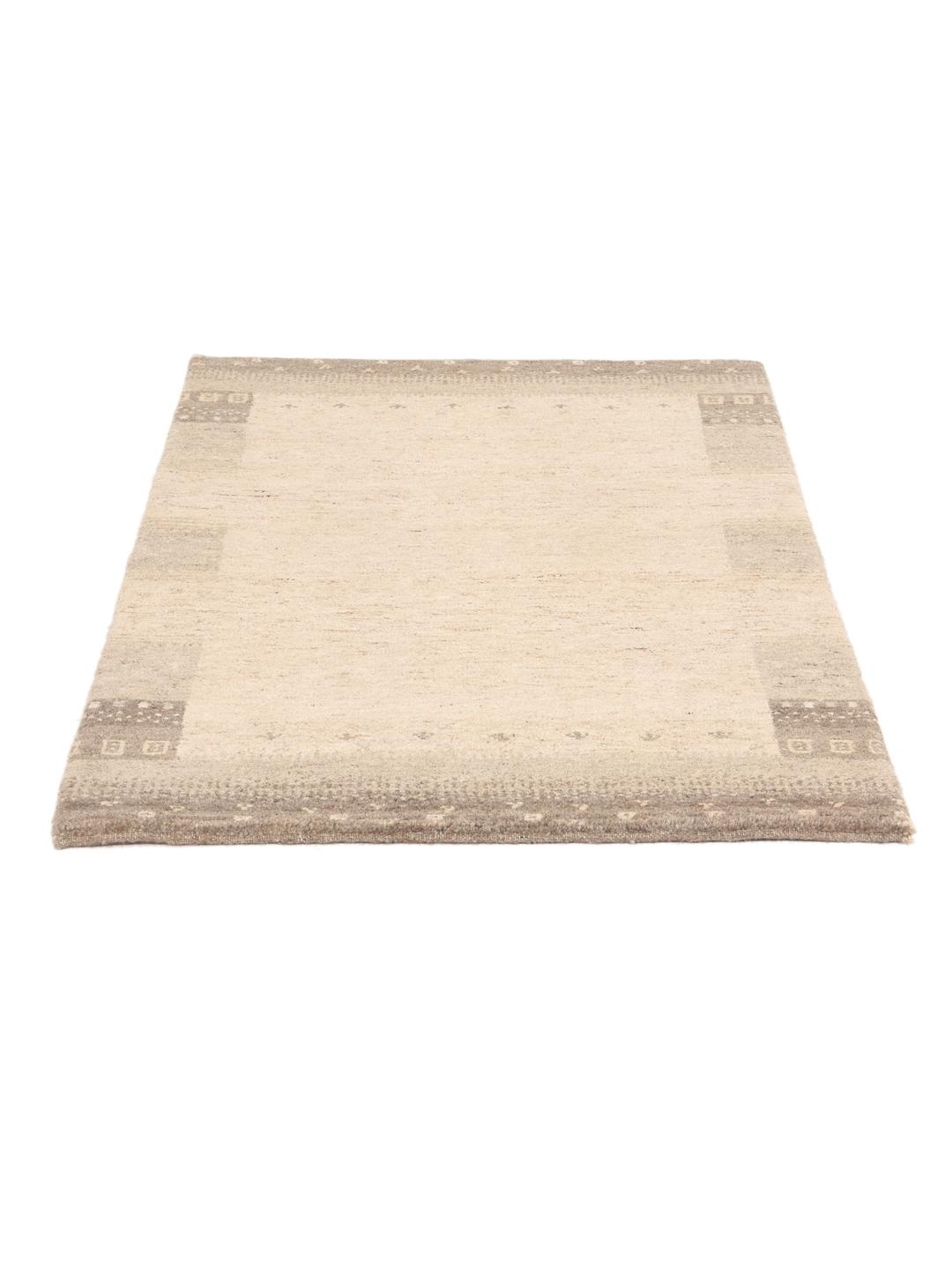 Hand-knotted beige Gabbeh rug from India