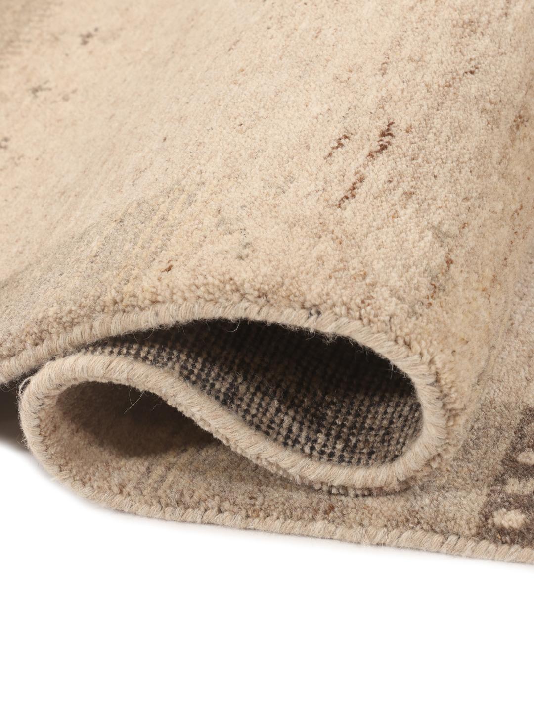 Hand-knotted beige Gabbeh rug from India