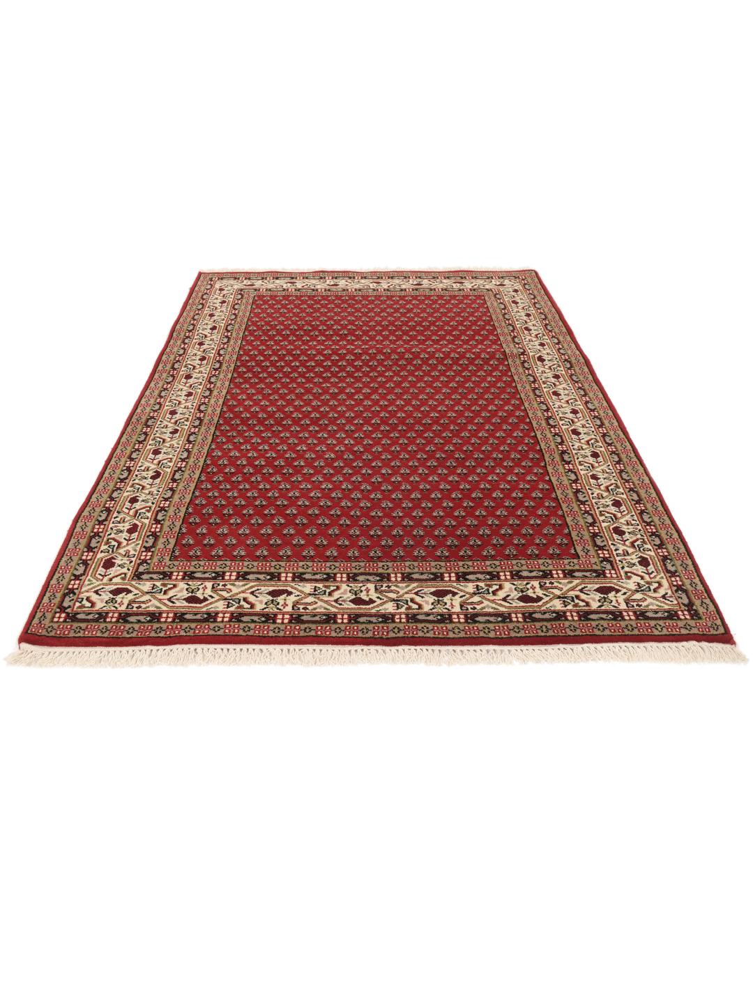 Handgeknoopt rood Mir Indo tapijt met traditionele bloemmotieven uit India.