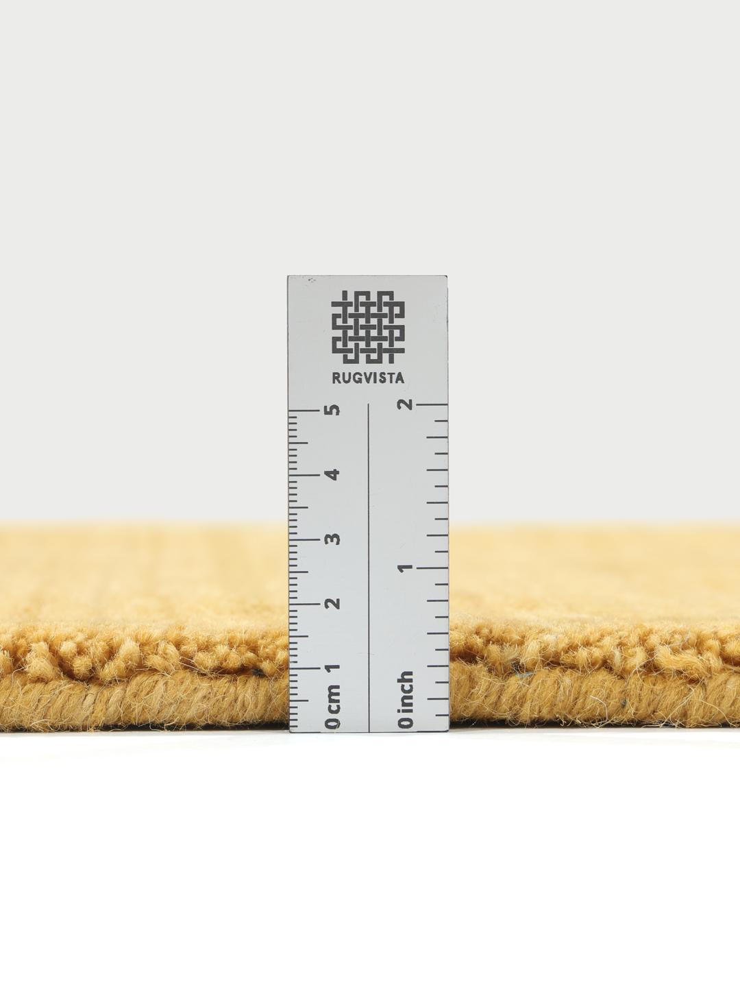 Geel hoogpolig vloerkleed met korte franjes