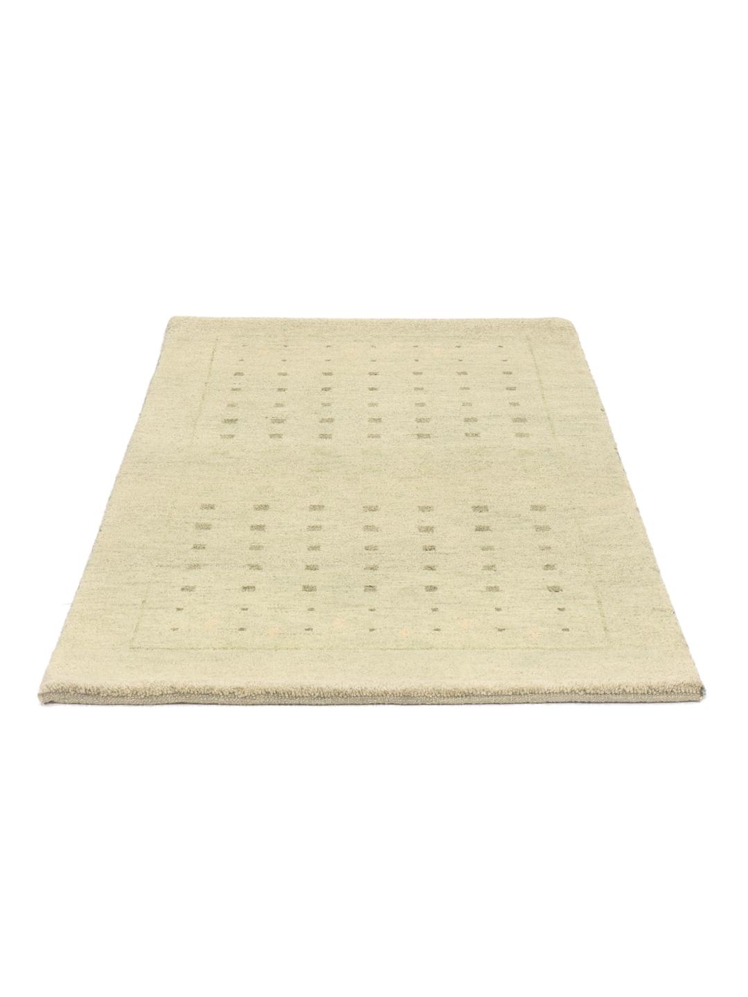Hand-knotted Gabbeh rug from India in a soft light-green shade