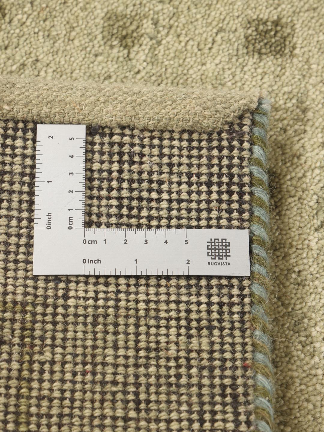 Hand-knotted Gabbeh rug from India in a soft light-green shade