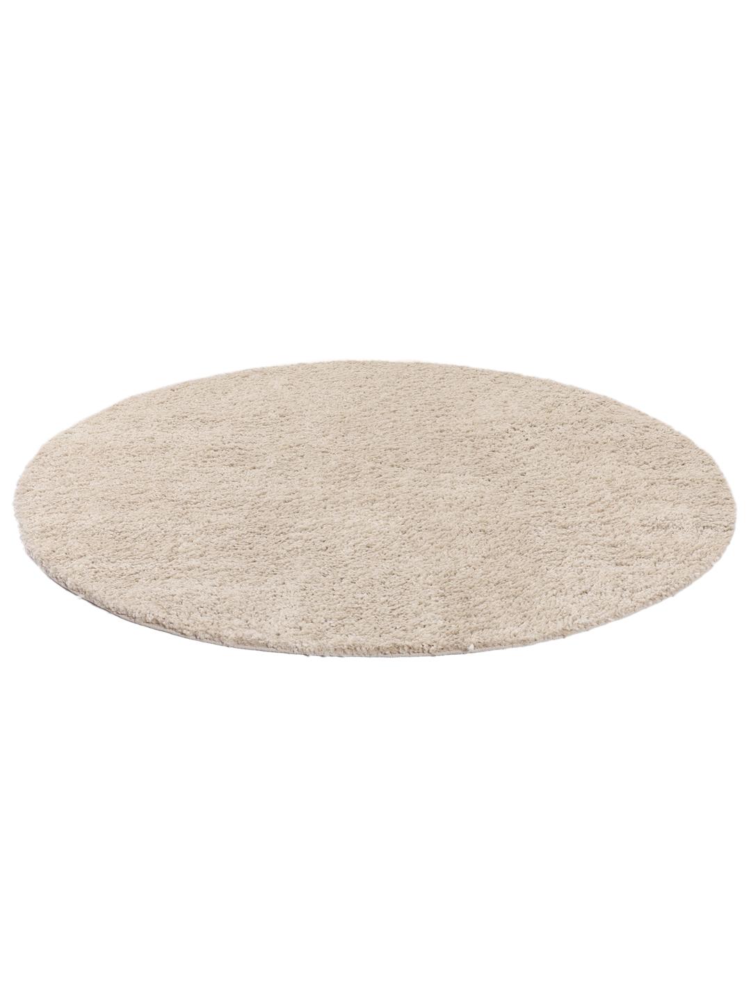 Rundt beige tæppe
