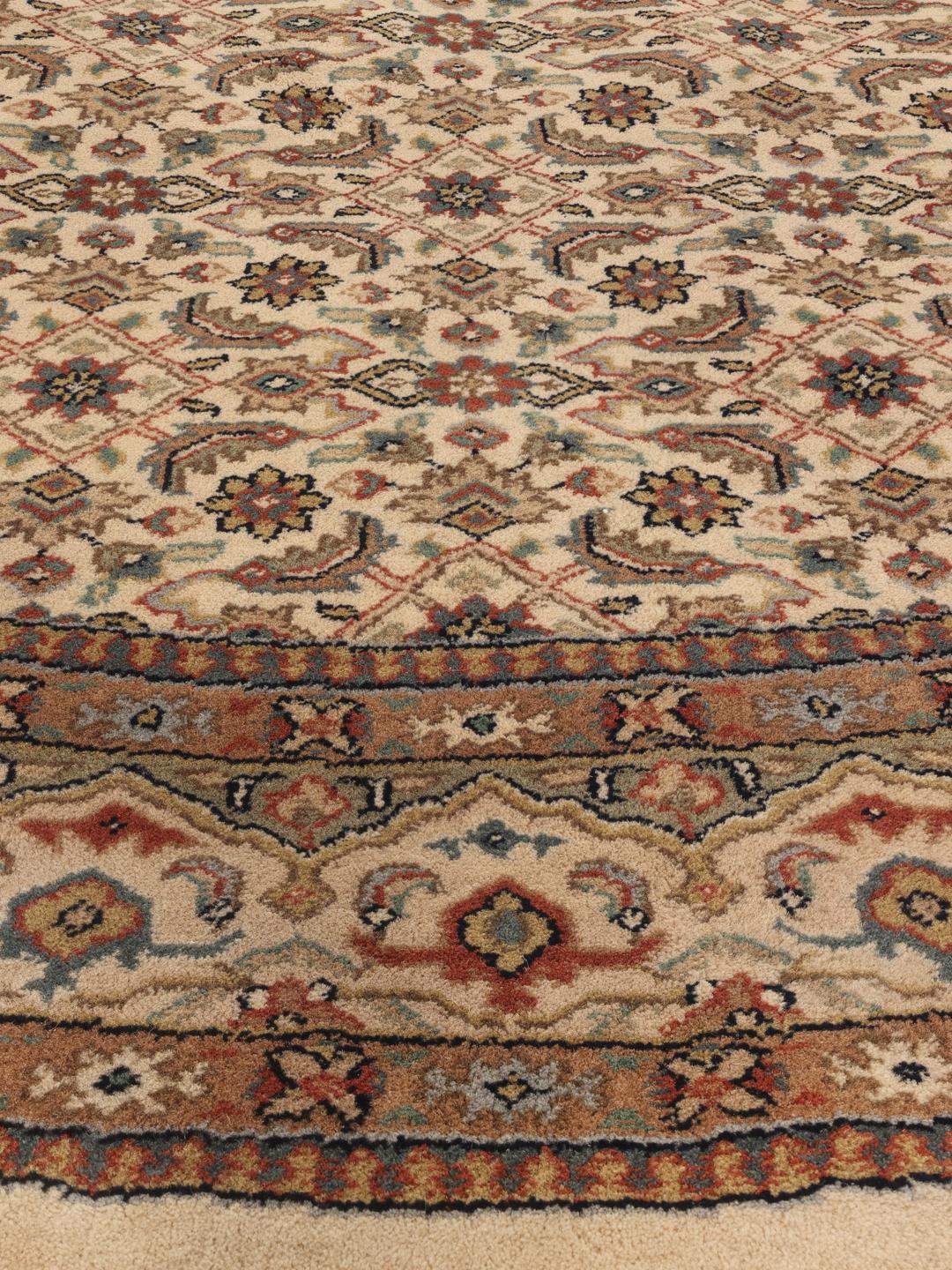 Rond Mir Indo-tapijt met ingewikkelde bloempatronen in beige, blauw en rood uit India