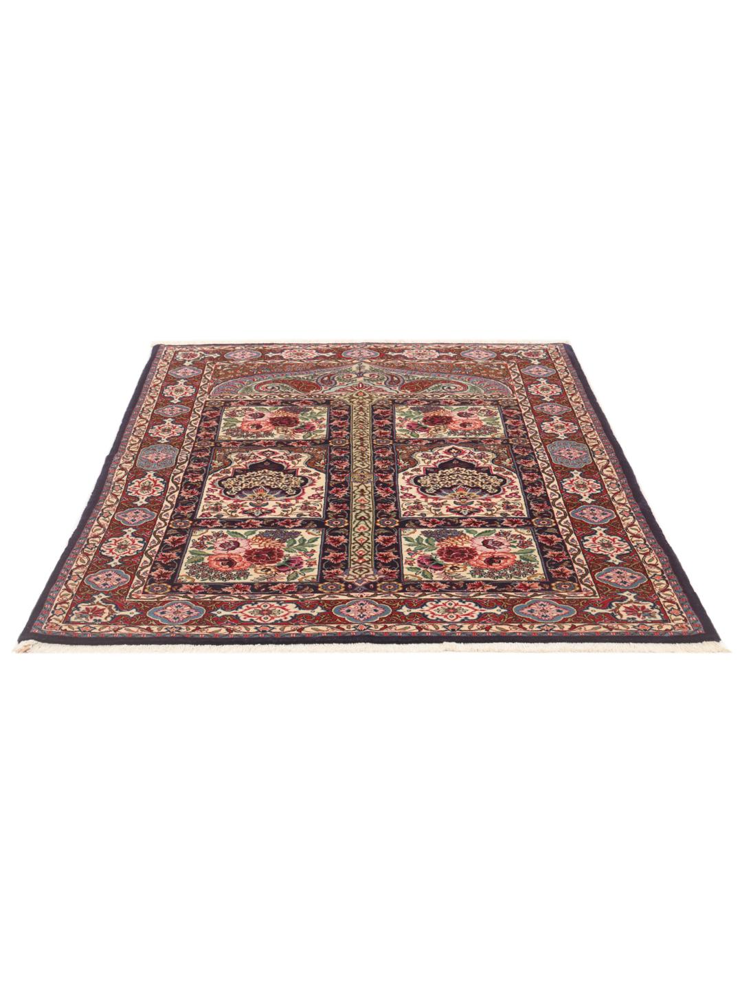 Hand-knotted Sarouk rug from the Middle East in deep red and cream tones