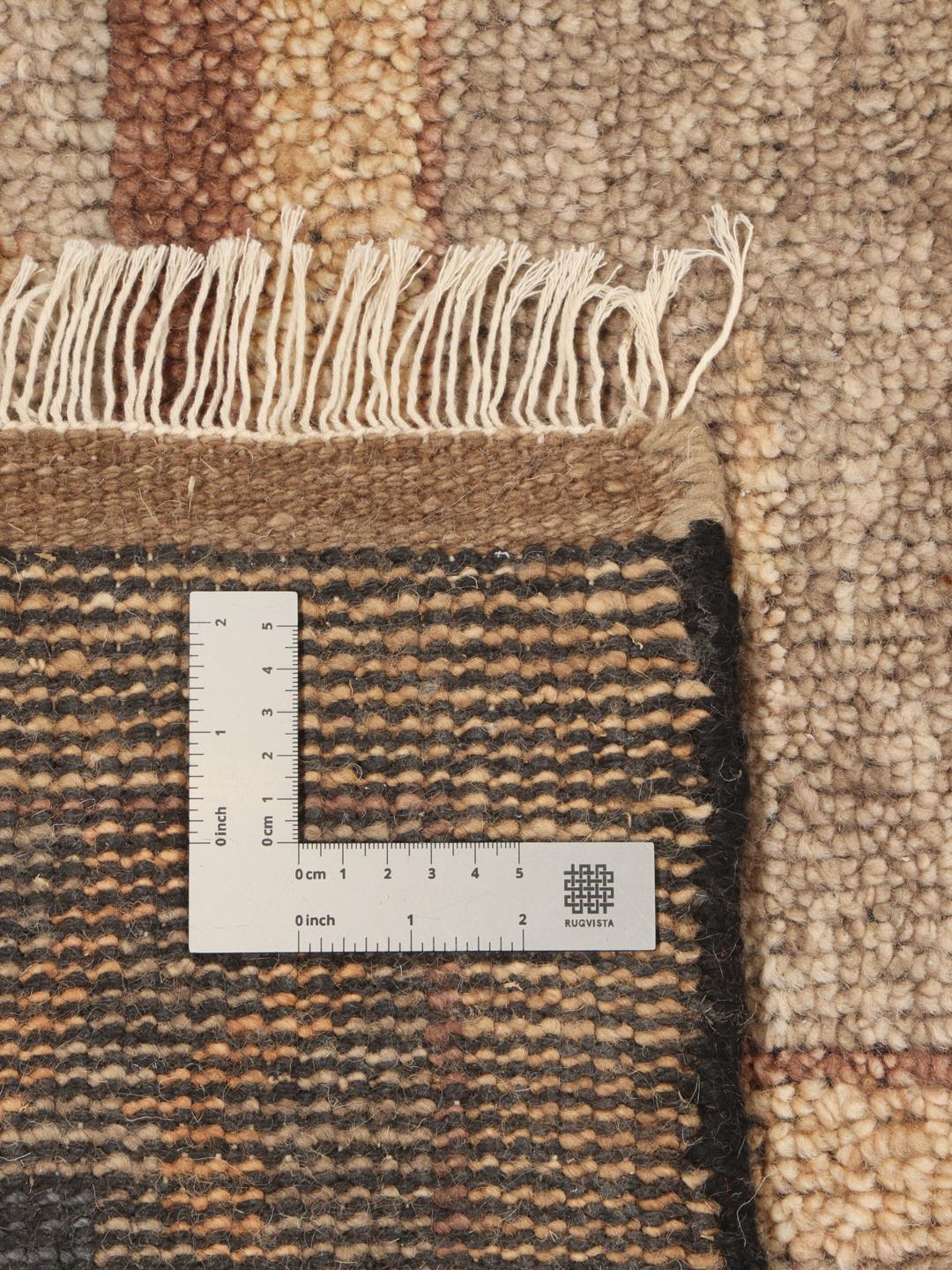 Handgeknoopt Indiaas Usak-tapijt in beige en blauw met een levensboompatroon.