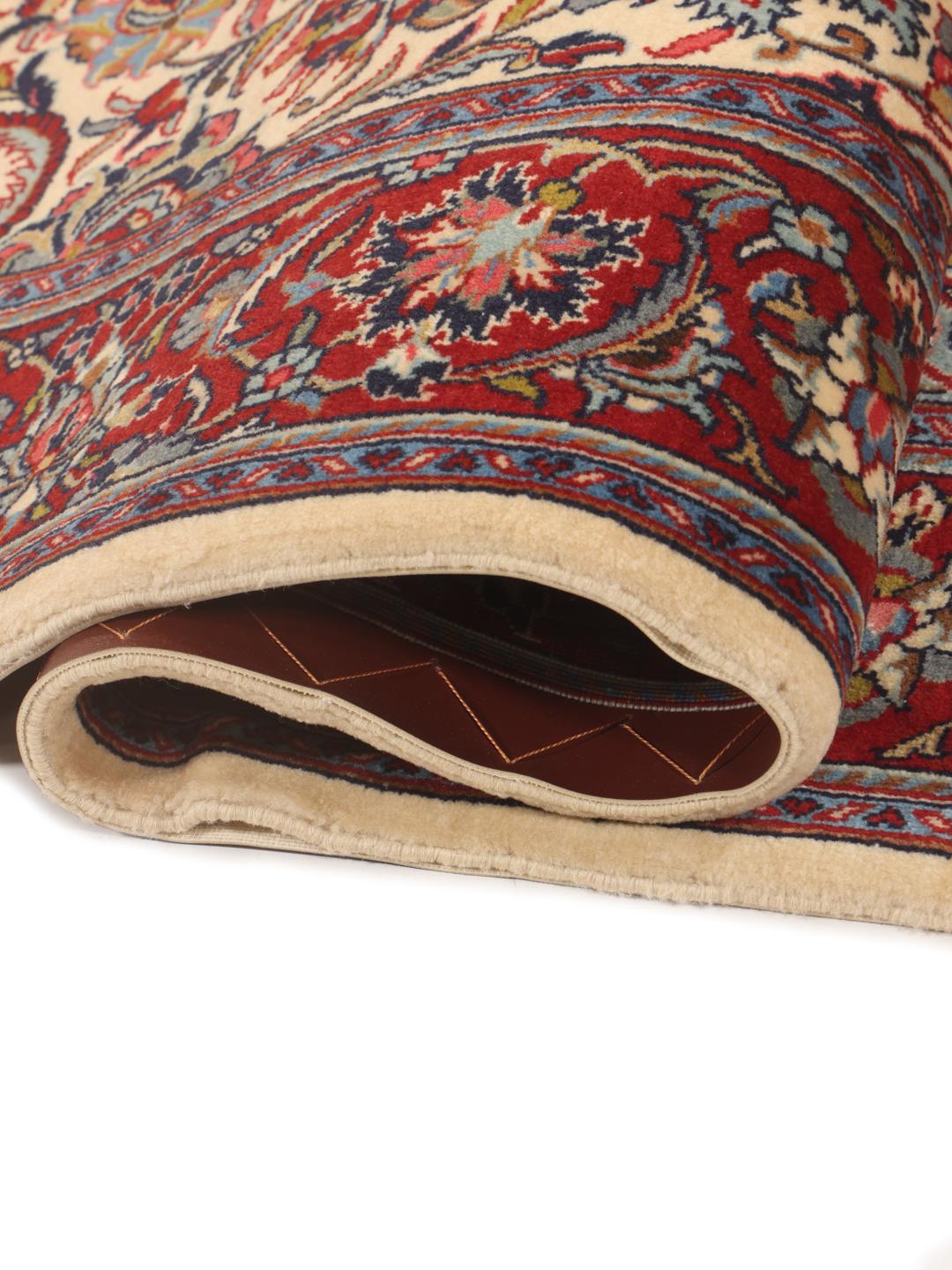 Hand-knotted Sarough rug from the Middle East featuring a vibrant red and blue pictorial floral design