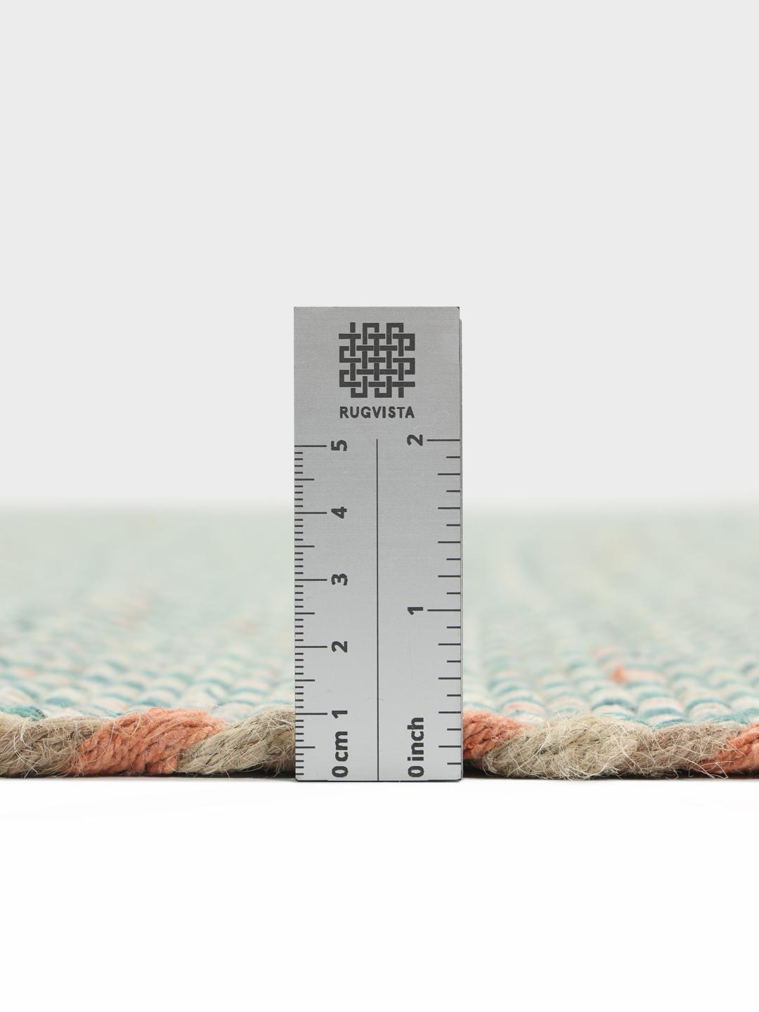 Handgeweven vloerkleed in turquoise, teal en koraalrood