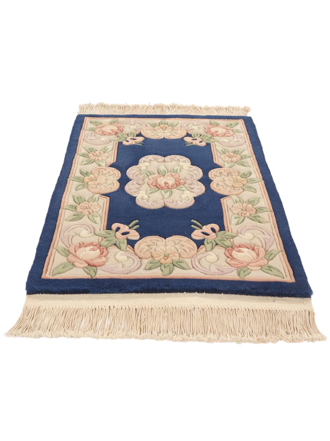 Hand-knotted floral rug from China in blue and beige