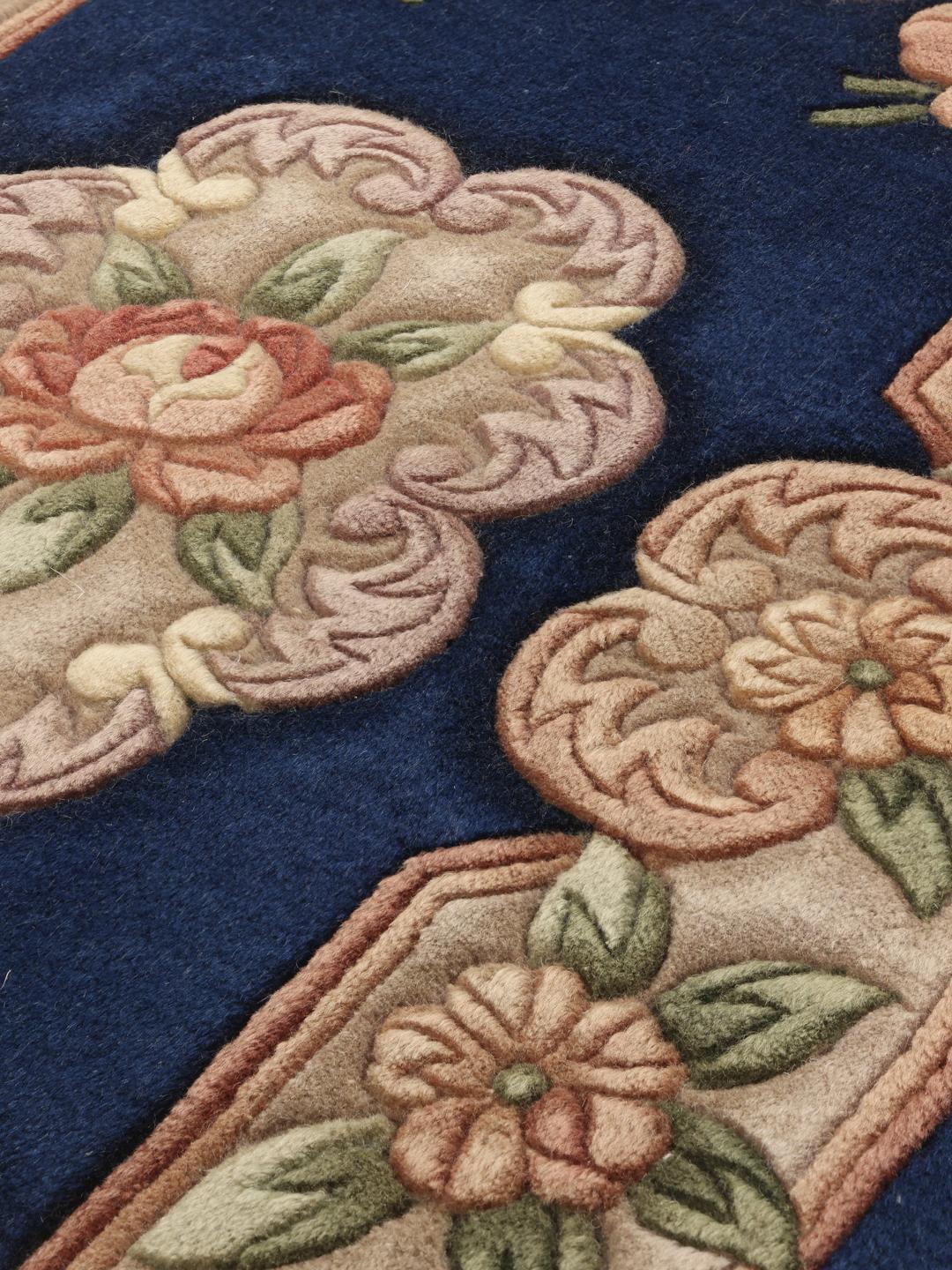 Hand-knotted floral rug from China in blue and beige