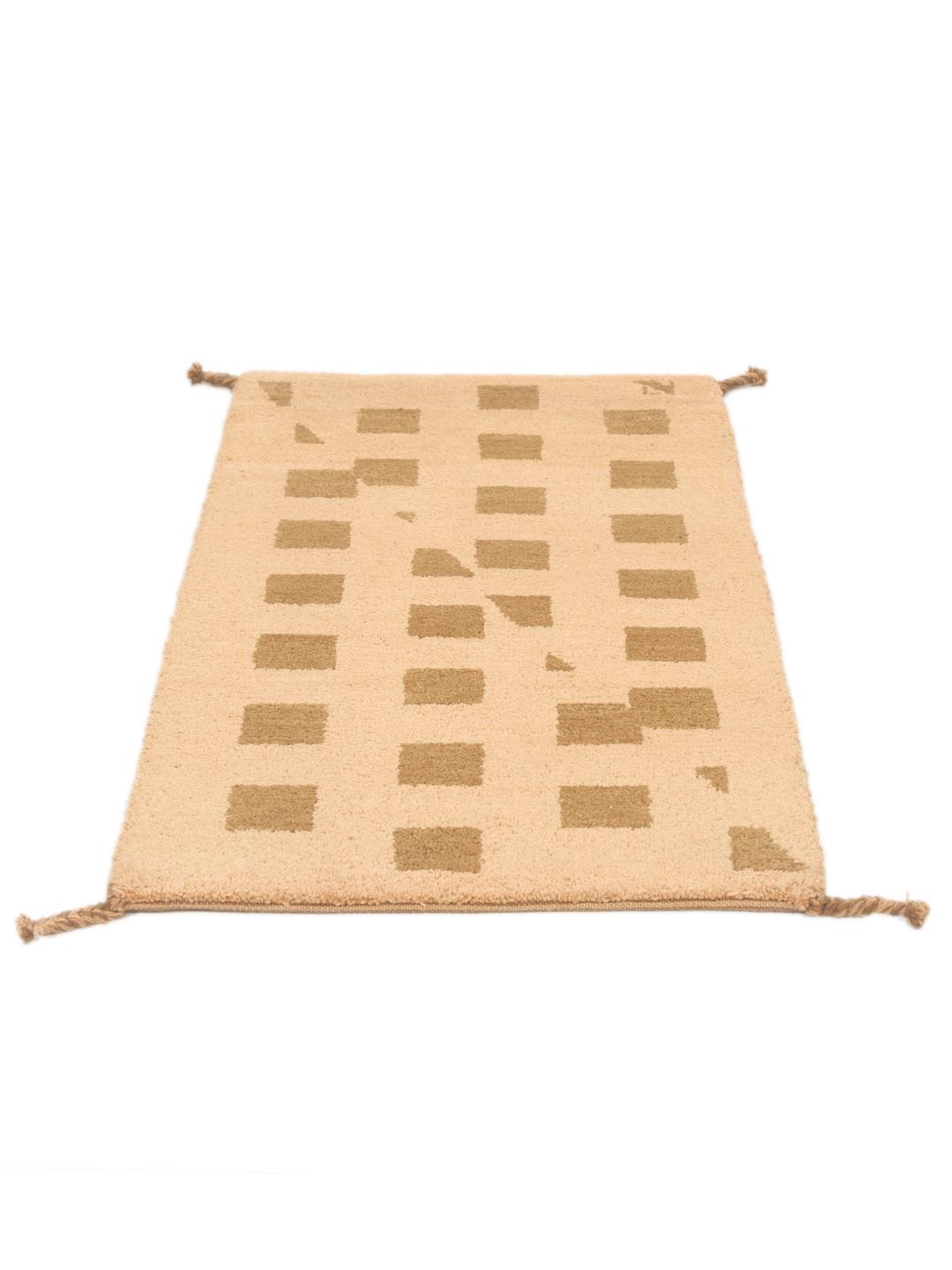 Hand-knotted Gabbeh rug from the Middle East in beige tones