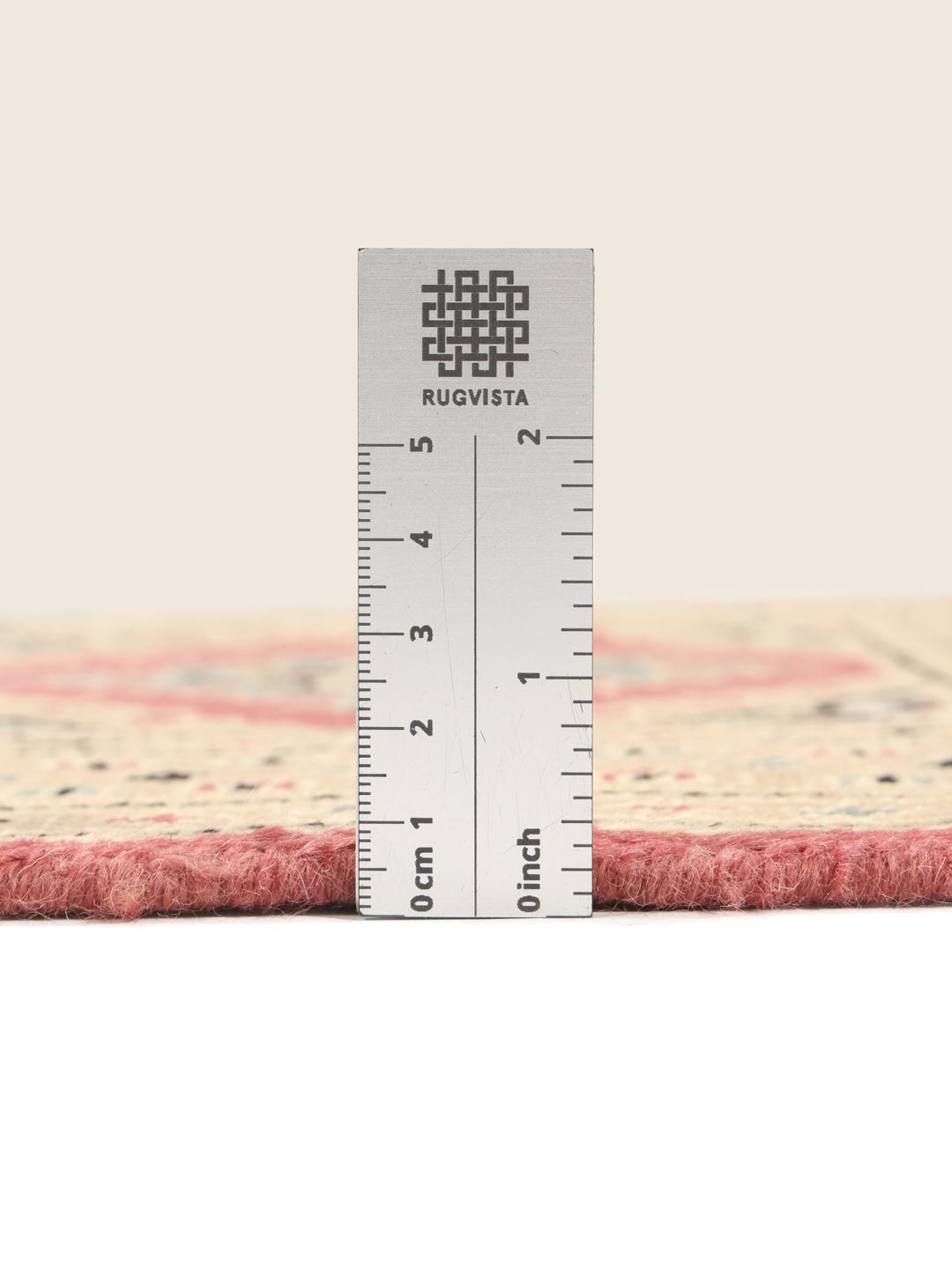 Hand-knotted Pakistan Bokhara rug with red and beige geometric floral patterns