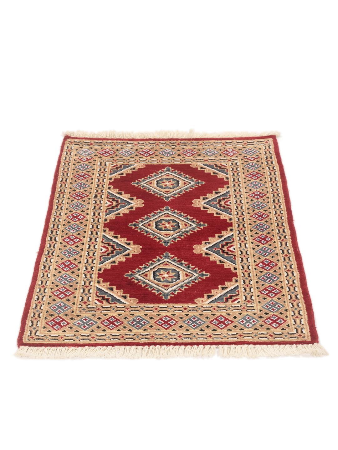 Hand-knotted red Pakistan Bokhara rug with geometric patterns