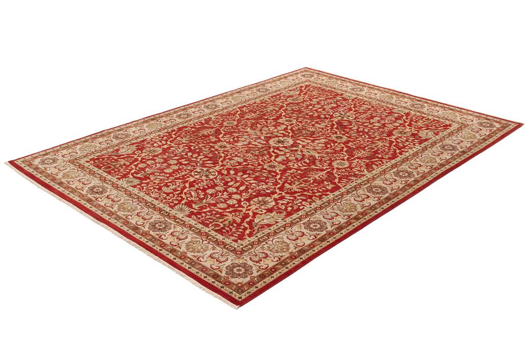 Handgeknoopt Indiaas tapijt in het rood met traditionele bloemmotieven