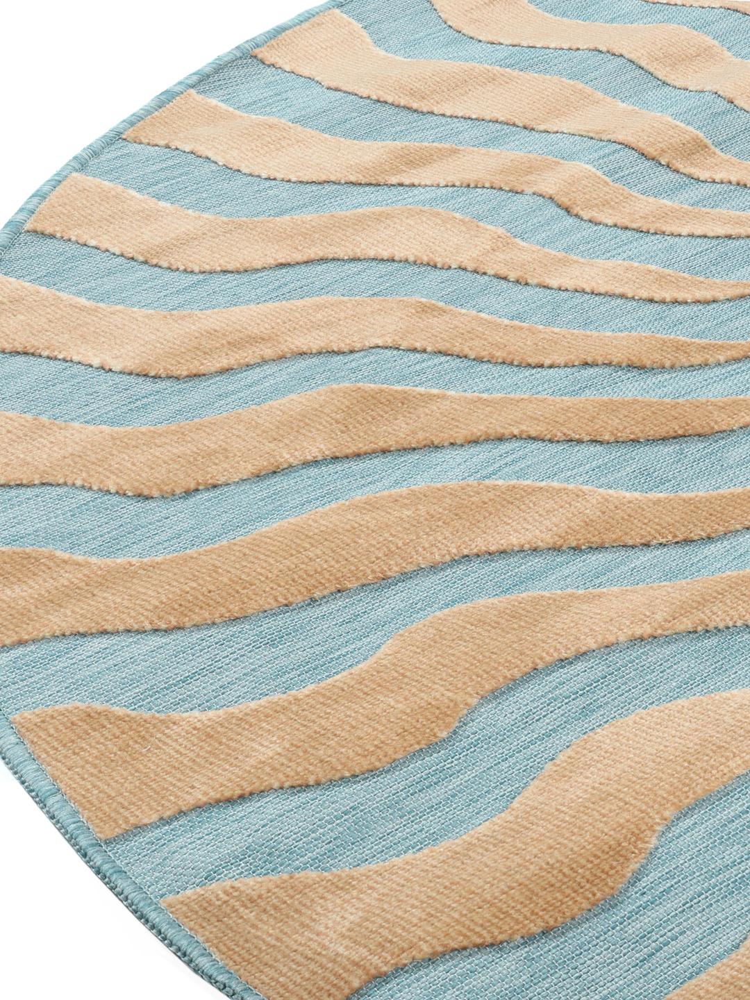 Rond tapijt in turquoise