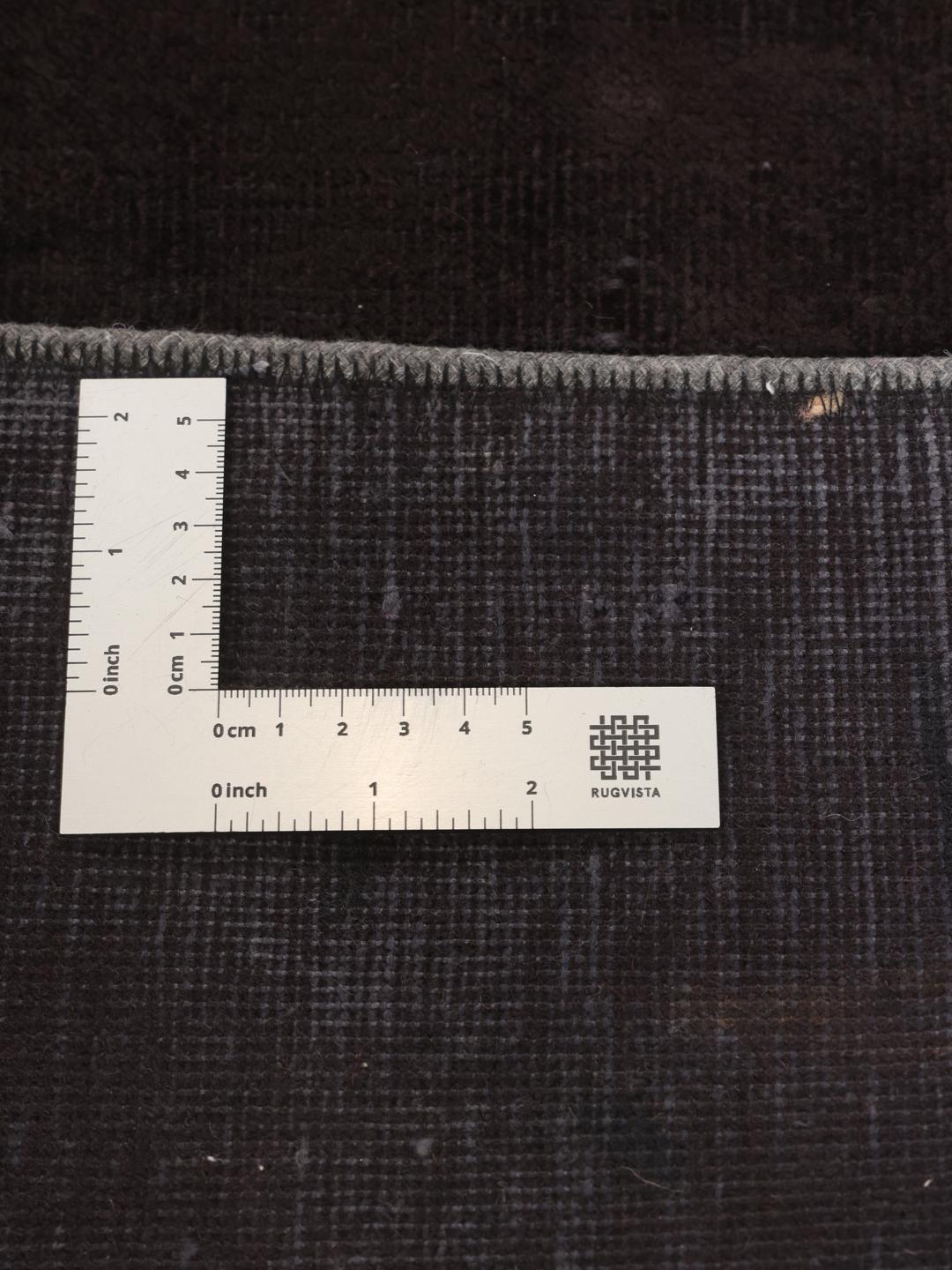 Hand-knotted patchwork rug from the Middle East in black