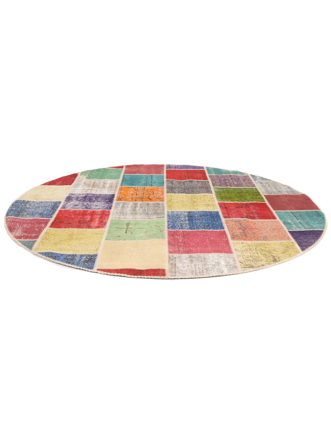 Rundt flerfarvet patchwork-tæppe fra Mellemøsten med et levende geometrisk design