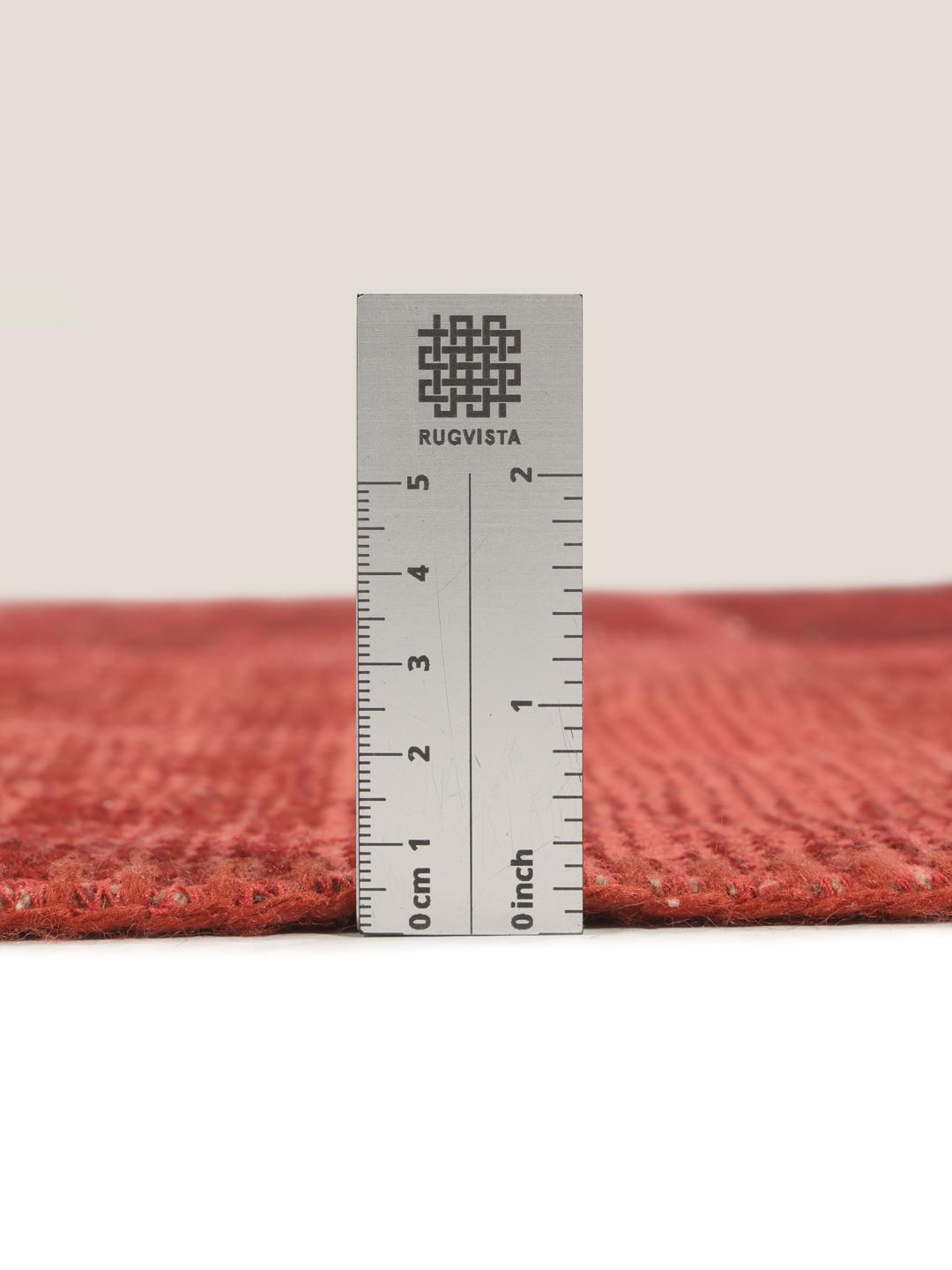 Handgeknoopt Patchwork tapijt uit Turkije met een donkerrood kleurenpalet