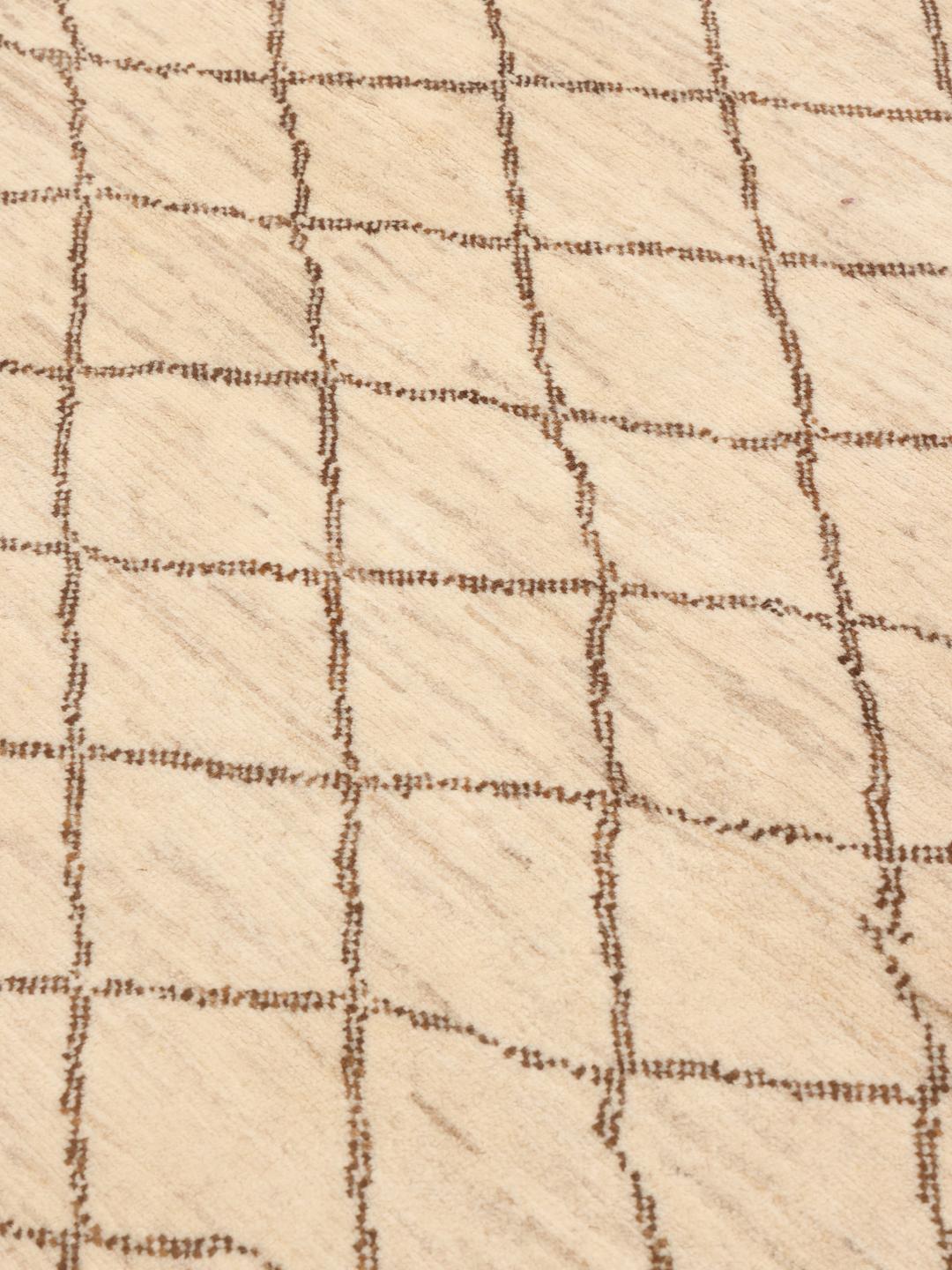 Hand-knotted Gabbeh Fine wool rug with geometric patterns in beige and brown, origin Middle East.