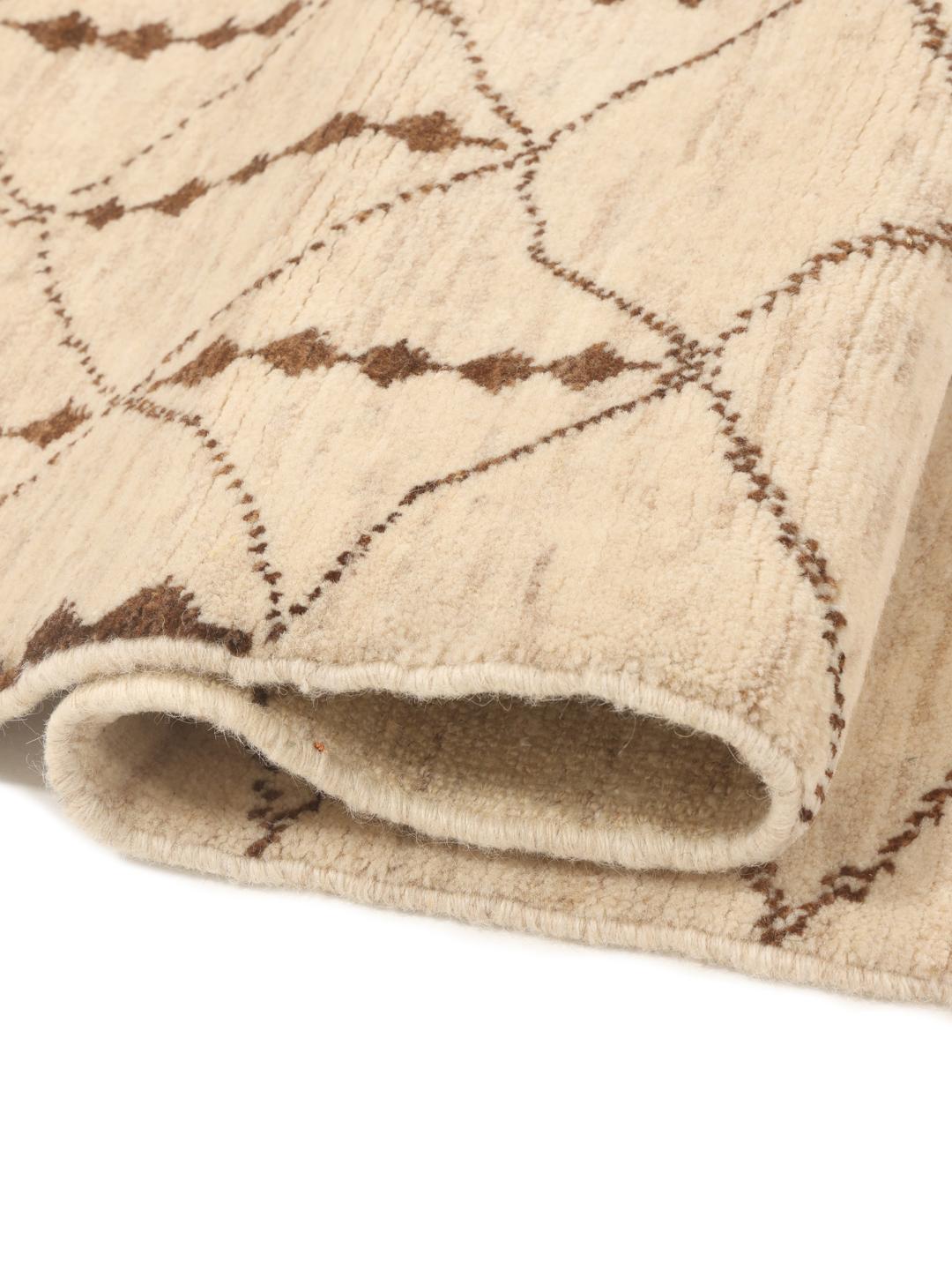 Hand-knotted Gabbeh Fine wool rug with geometric patterns in beige and brown, origin Middle East.