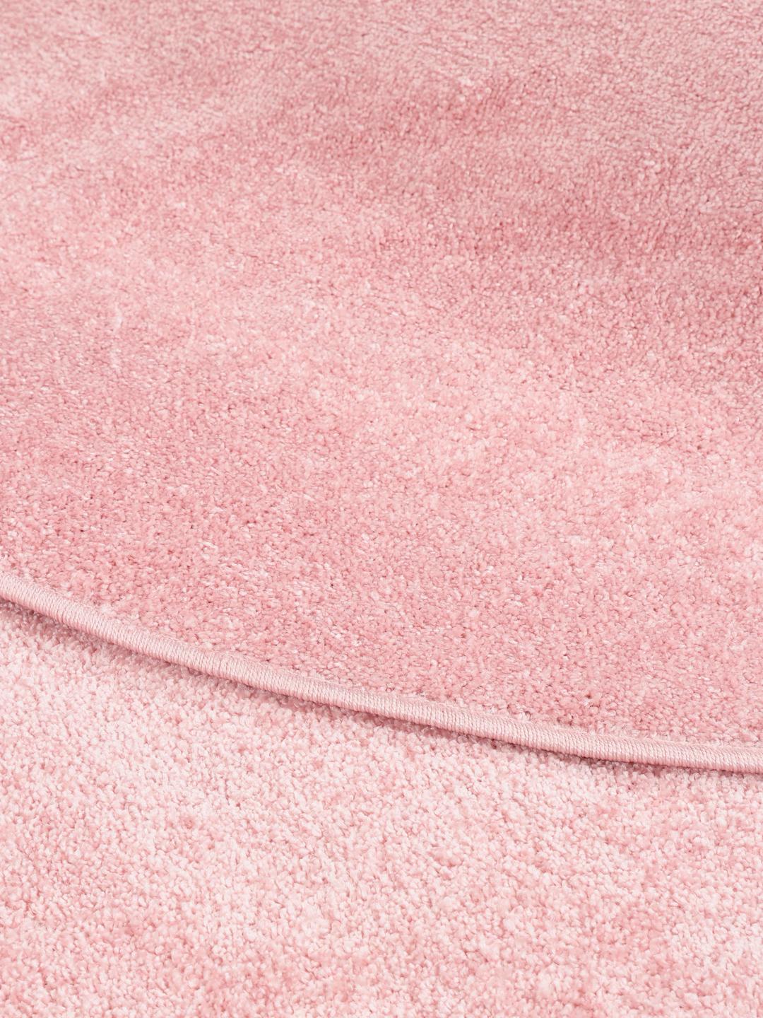 Round pink rug