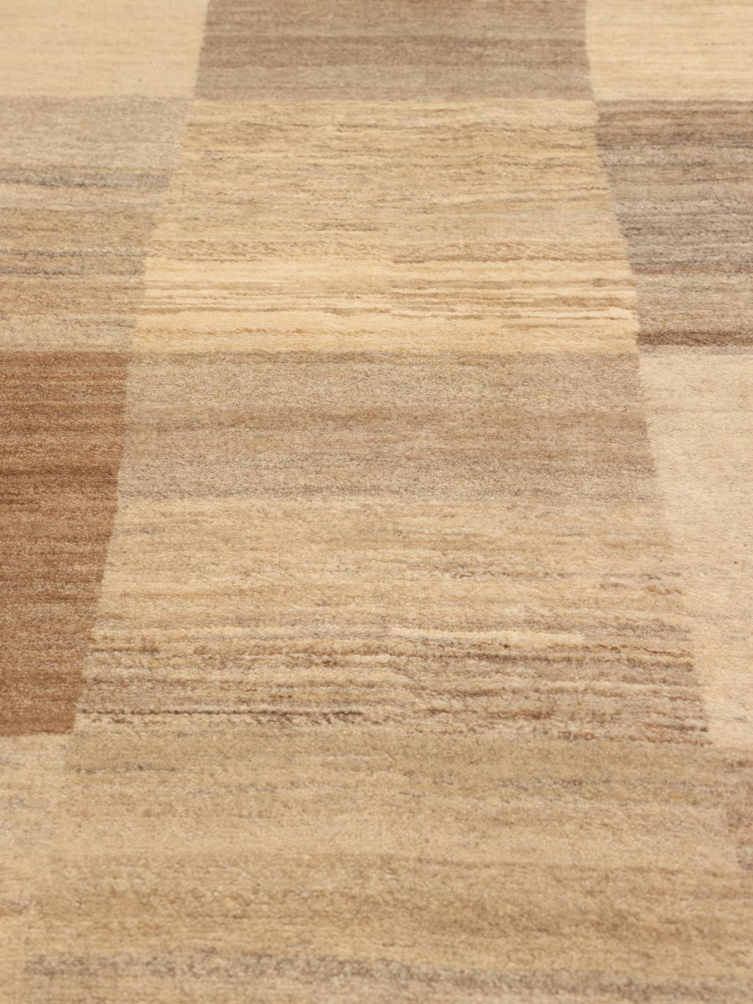 Hand-knotted Gabbeh Fine Wool rug with a geometric pattern in beige tones from the Middle East.