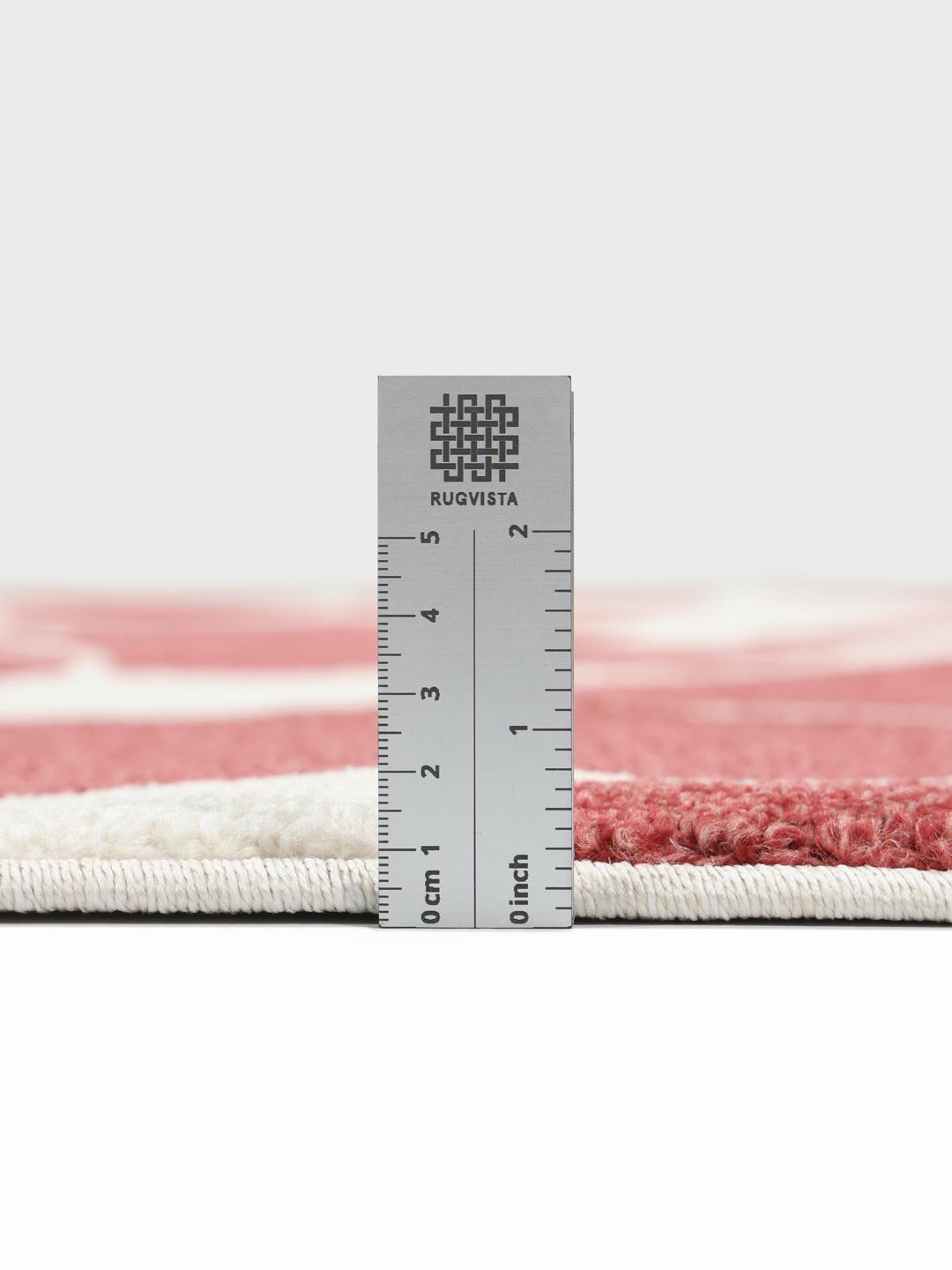 Tapis floral rouge profond et blanc cassé