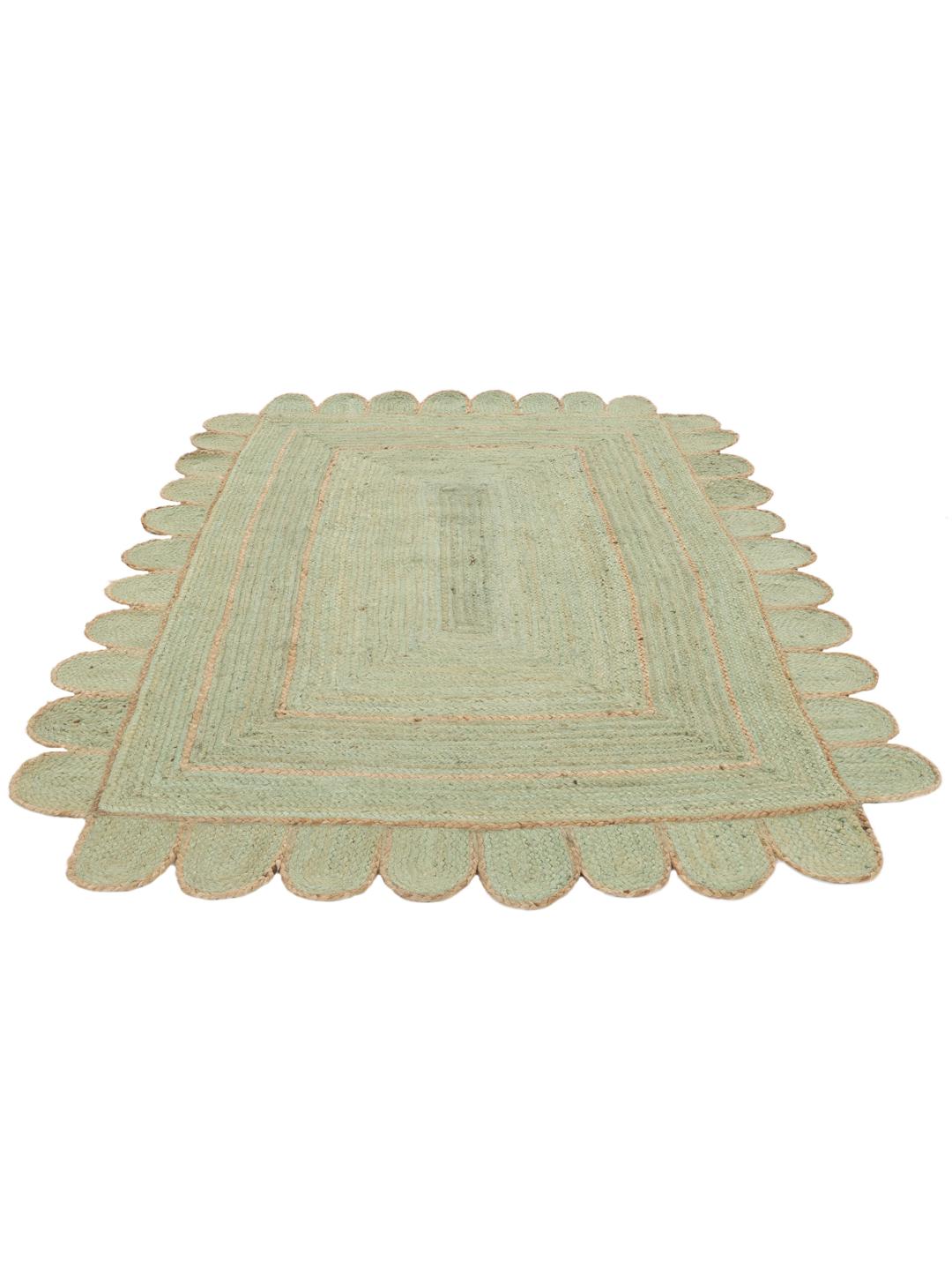 Groen vloerkleed met schulprand