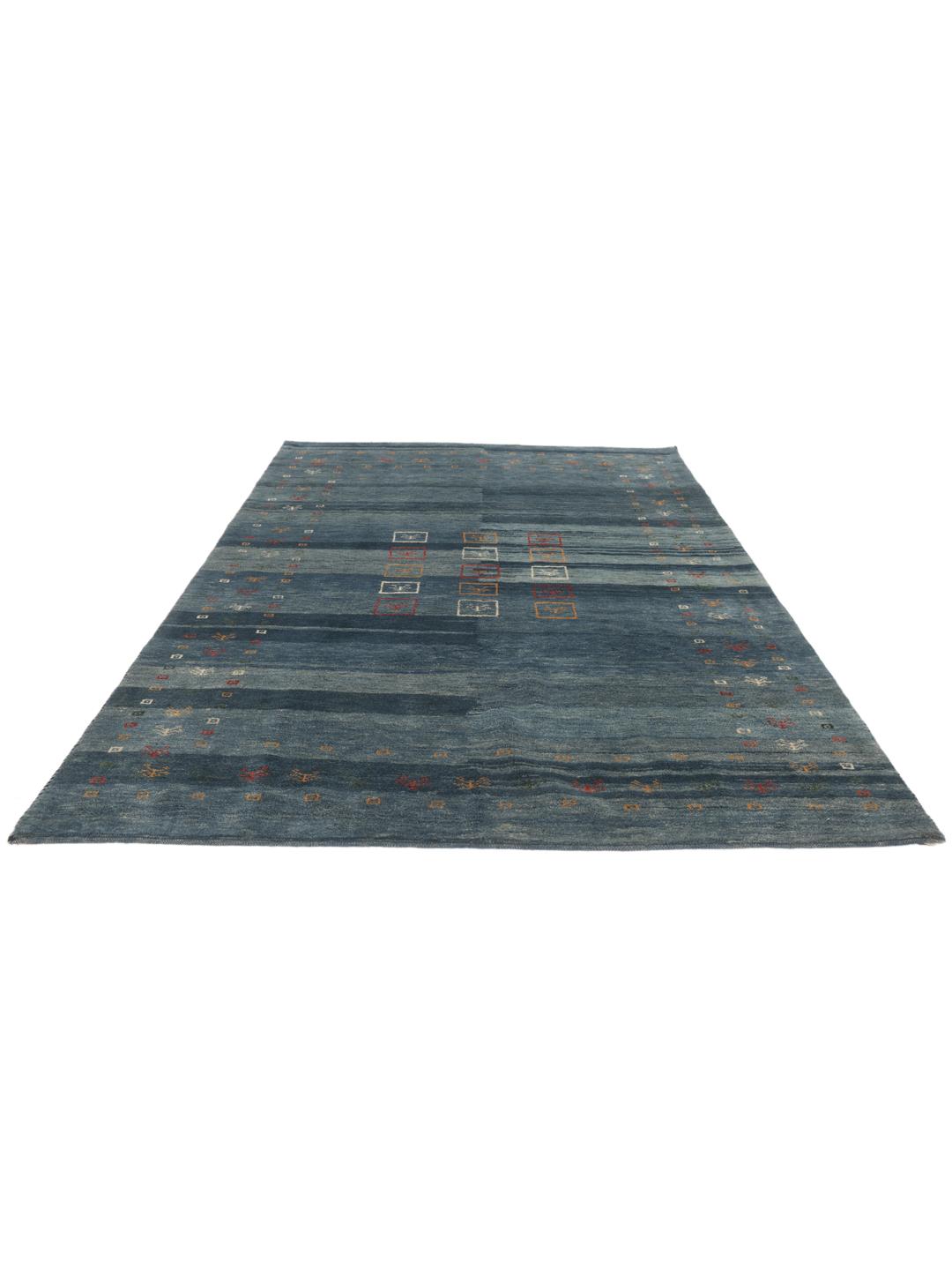 A rectangular hand-knotted Gabbeh Fine rug from the Middle East in deep blue
