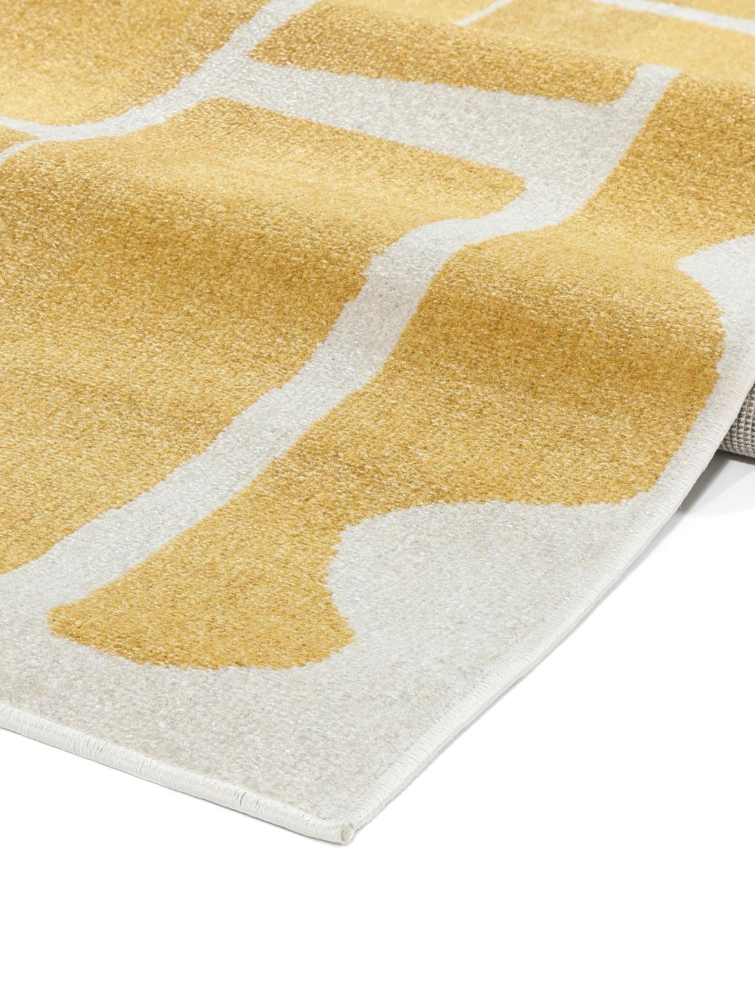Geel en wit vloerkleed