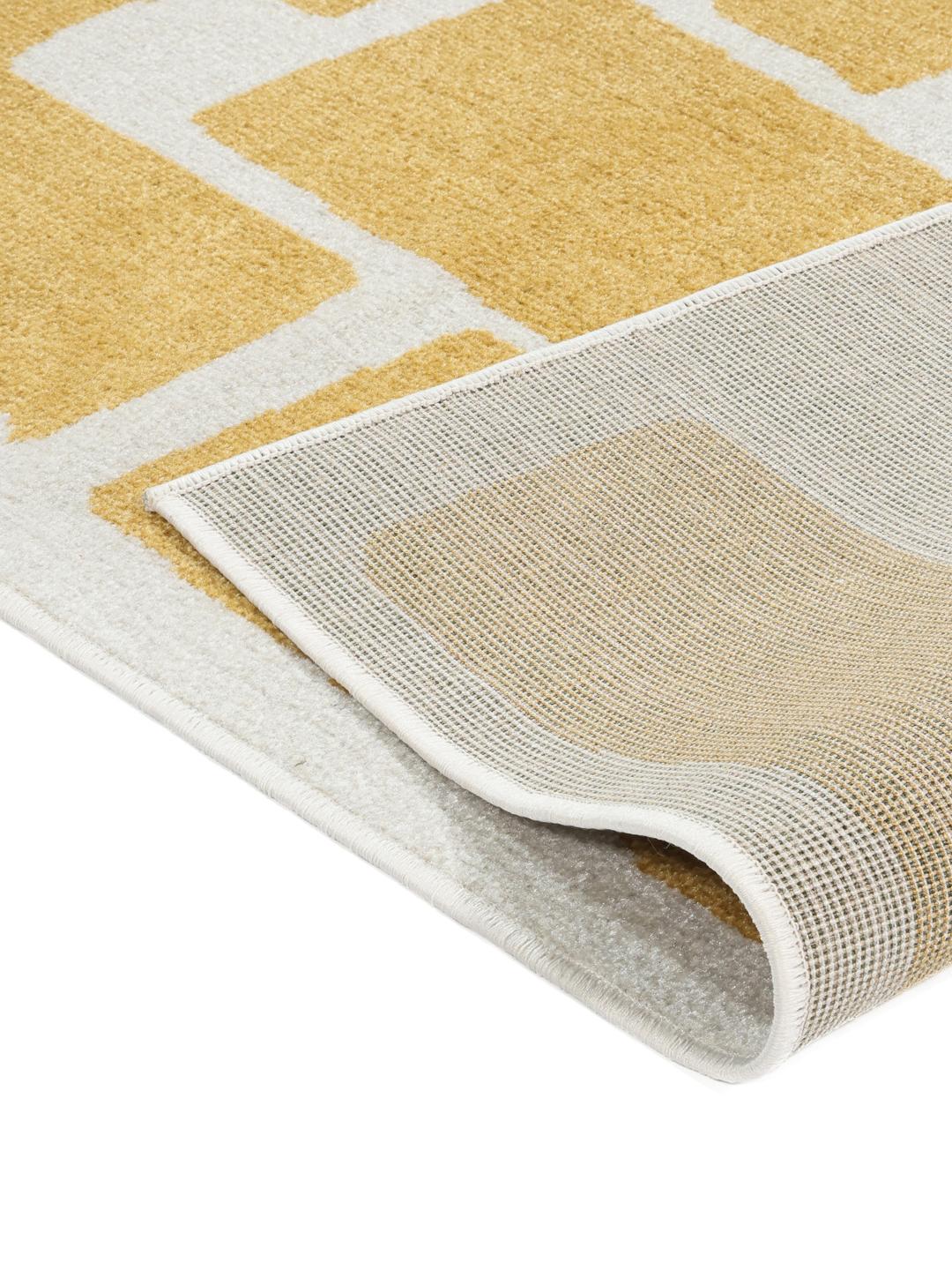 Geel en wit vloerkleed