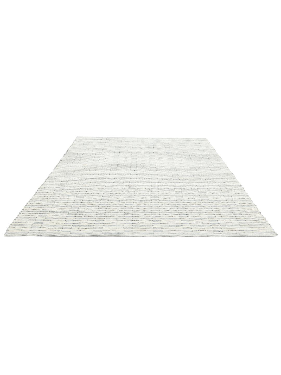 Tapis bleu et blanc avec une texture tissée