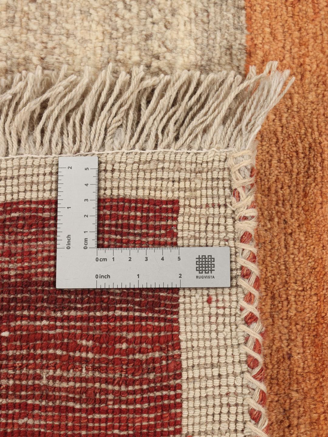 Handgeknoopt Gabbeh-tapijt uit het Midden-Oosten met een veelkleurig streeppatroon.