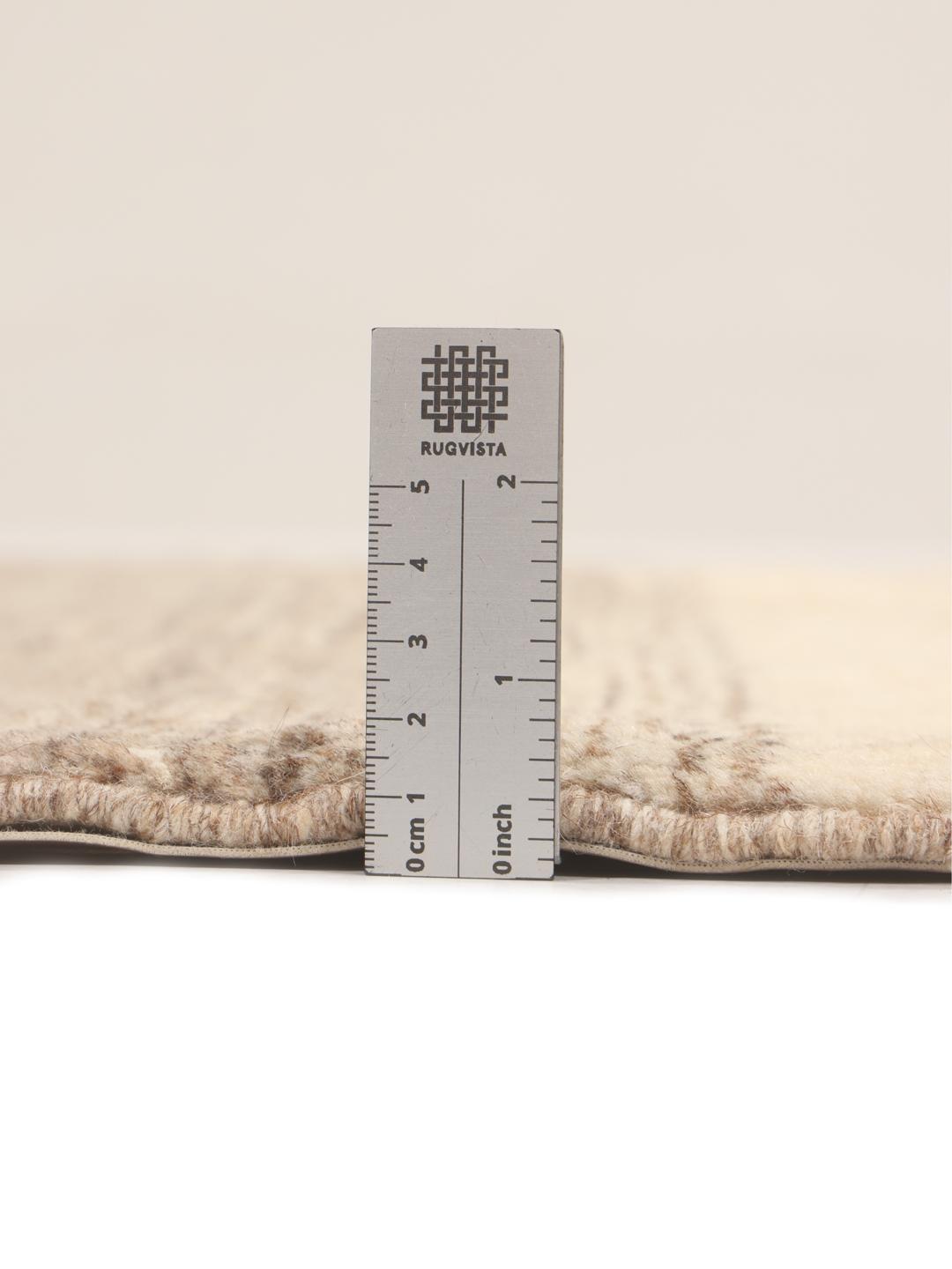 Handgeknoopt Gabbeh Fine vloerkleed uit het Midden-Oosten in beige en bruine tinten.