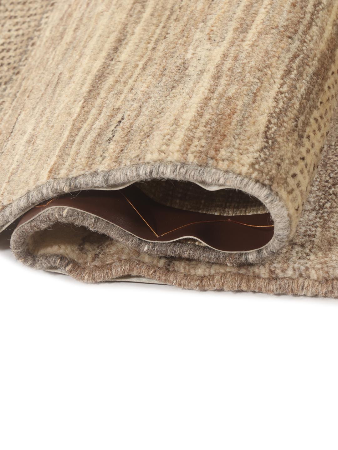 Hand-knotted Gabbeh rug from the Middle East in brown and beige tones