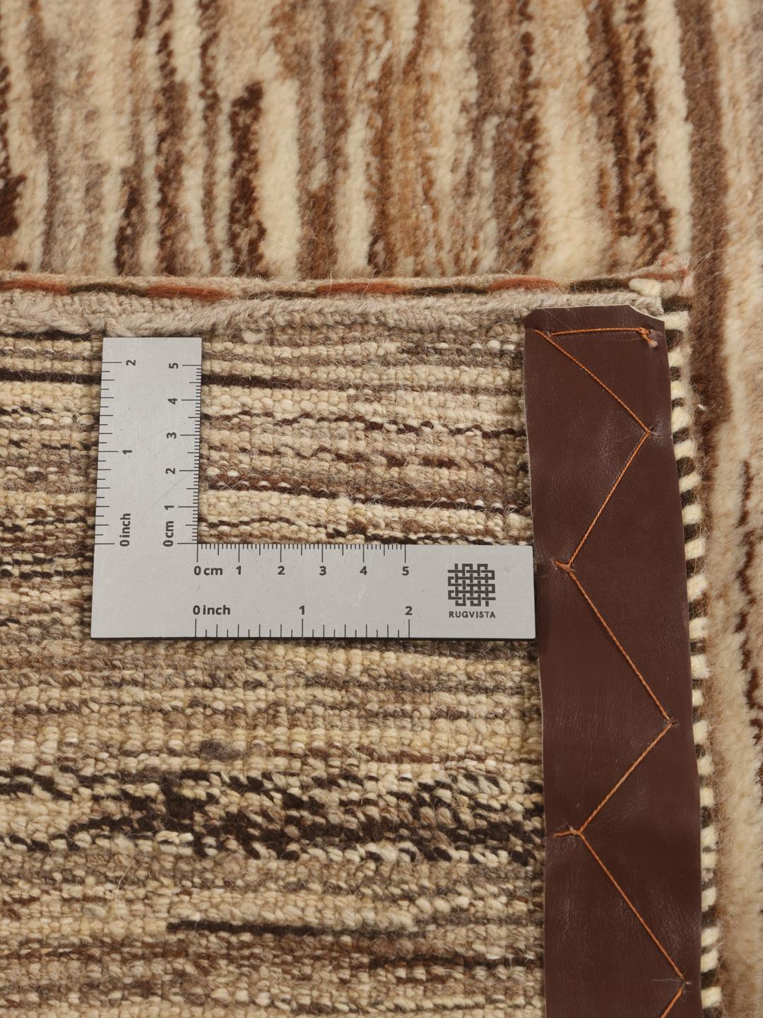 Hand-knotted Gabbeh rug from the Middle East in brown and beige tones